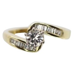 14 Karat Yellow Gold Bypass Baguette and Round Diamond Engagement Ring