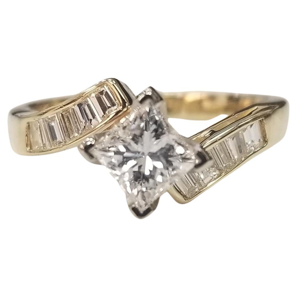 14 Karat Yellow Gold Bypass Baguette and Round Diamond Engagement Ring For Sale