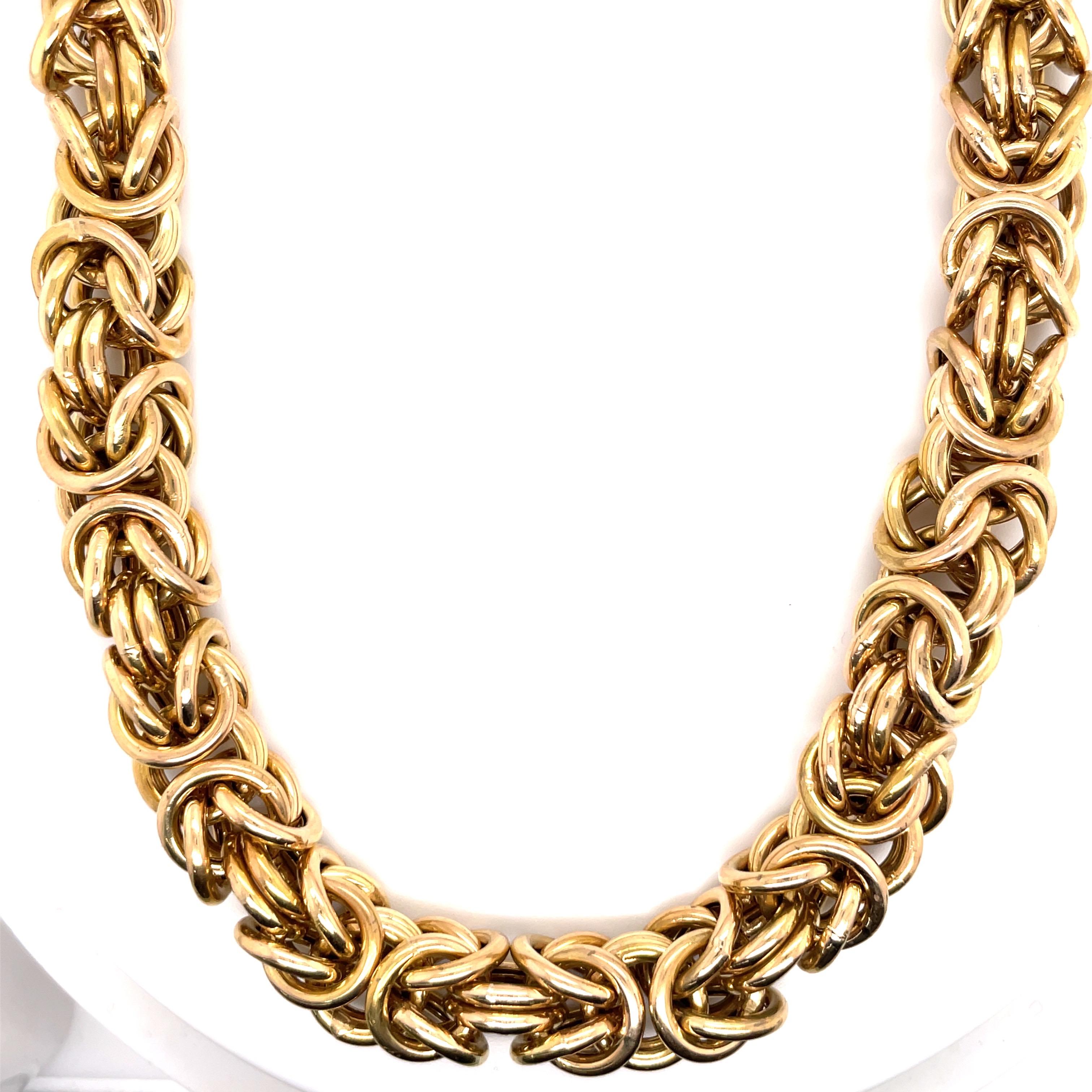 14 Karat Yellow gold necklace featuring a wide Byzantine style link measuring 17.5 inches and weighing 105.6 Grams.
Very comfortable on the neck. 