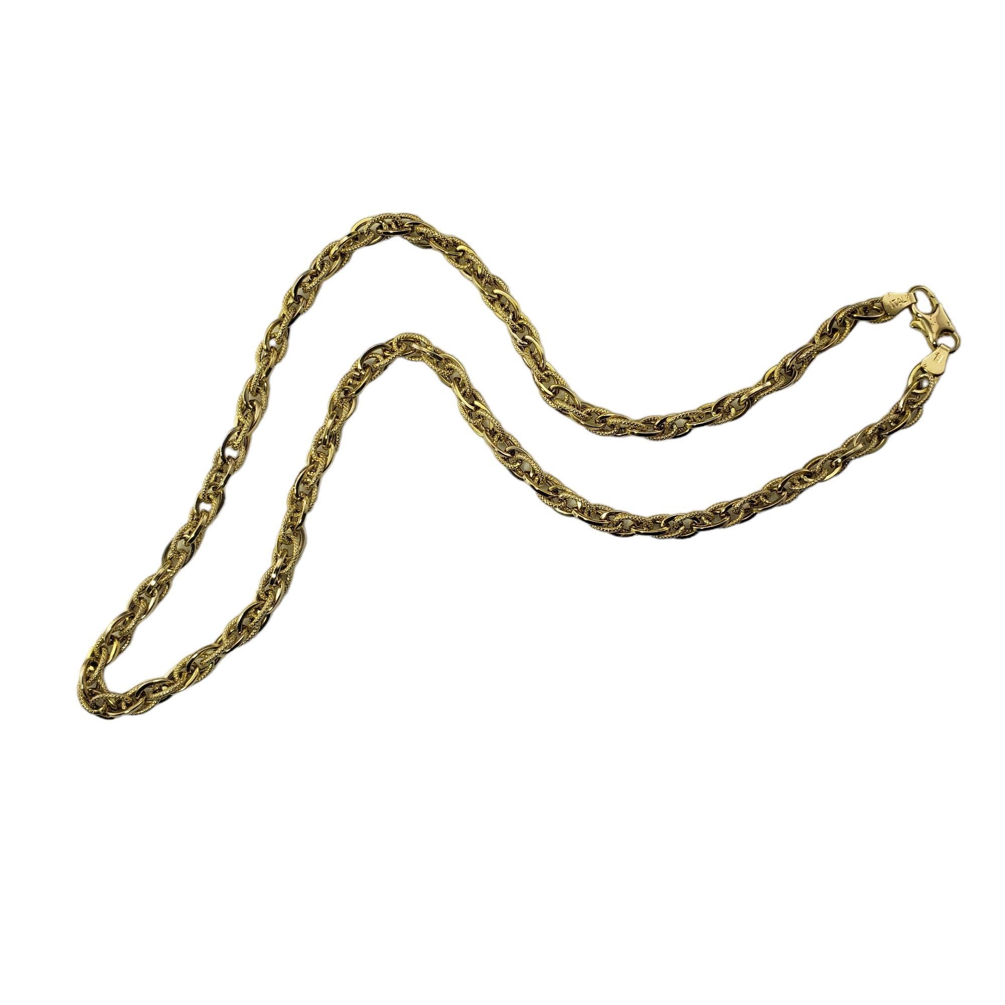 Vintage 14 Karat Yellow Gold Cable Chain Necklace-

This elegant cable chain necklace is crafted in meticulously detailed 14K yellow gold.  Width:  5 mm.

Size: 17 inches

Stamped: BREV  585

Weight: 10.0 gr./ 6.4 dwt.

Very good condition,