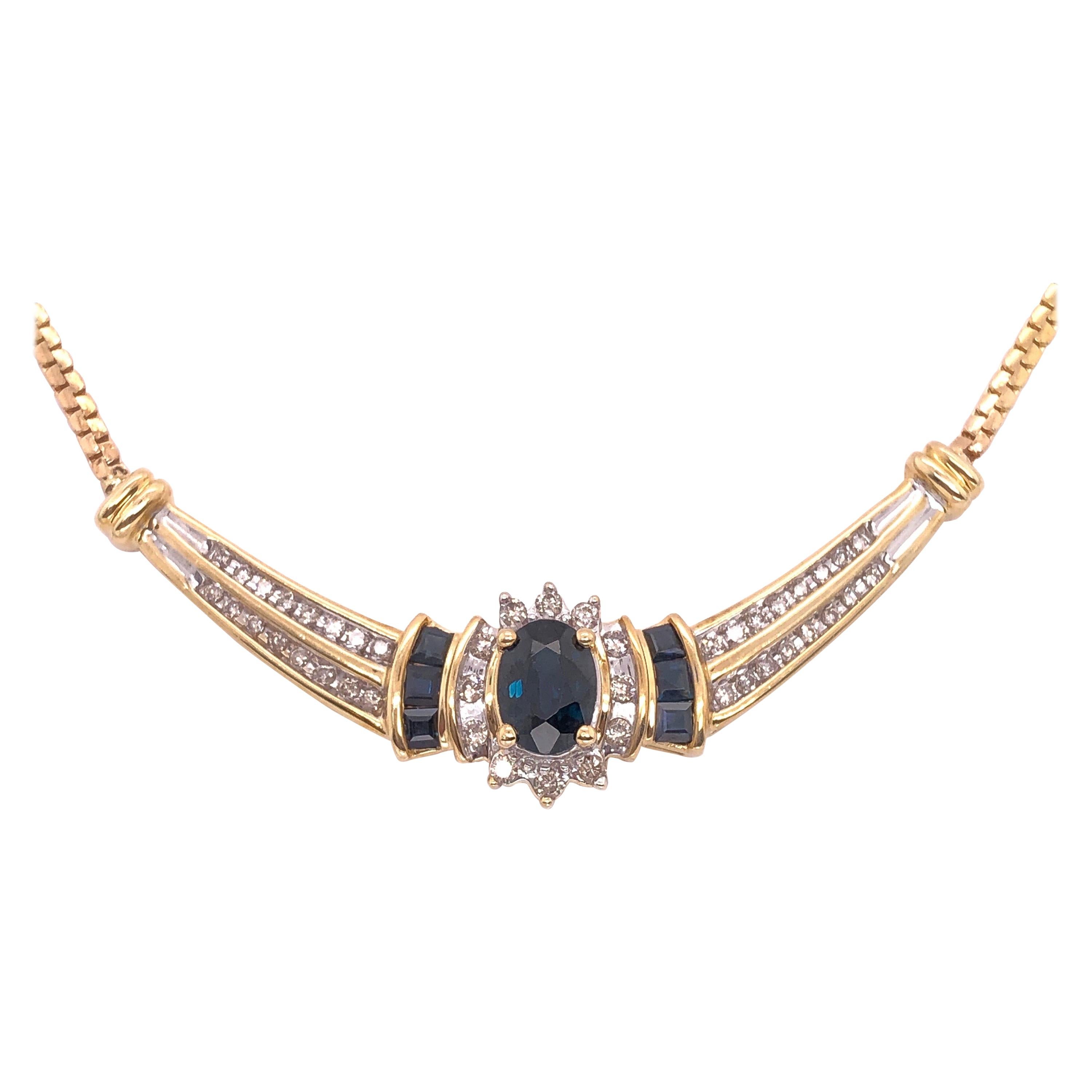 14 Karat Yellow Gold Cable Necklace with Oval Sapphire 1.00 Total Diamond Weight