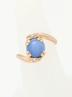 14 Karat Yellow Gold Cabochon Star Sapphire and Diamond Ring