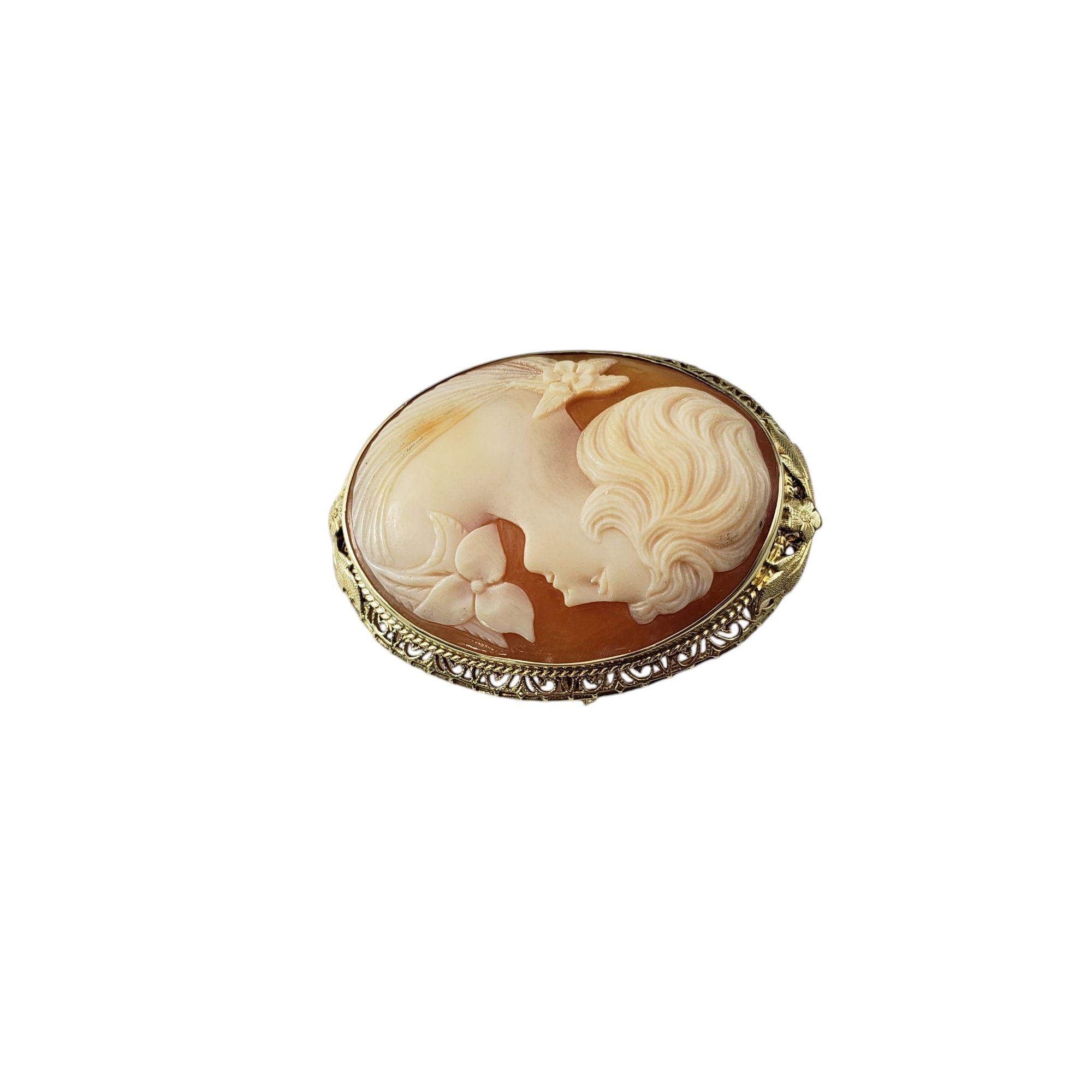 14K Yellow Gold Cameo Brooch/Pendant-

This timeless cameo features a delicately carved lady in profile, combining classic elegance with intricate craftsmanship. This stunning piece is framed by an exquisite filigree setting in 14K yellow gold. Can