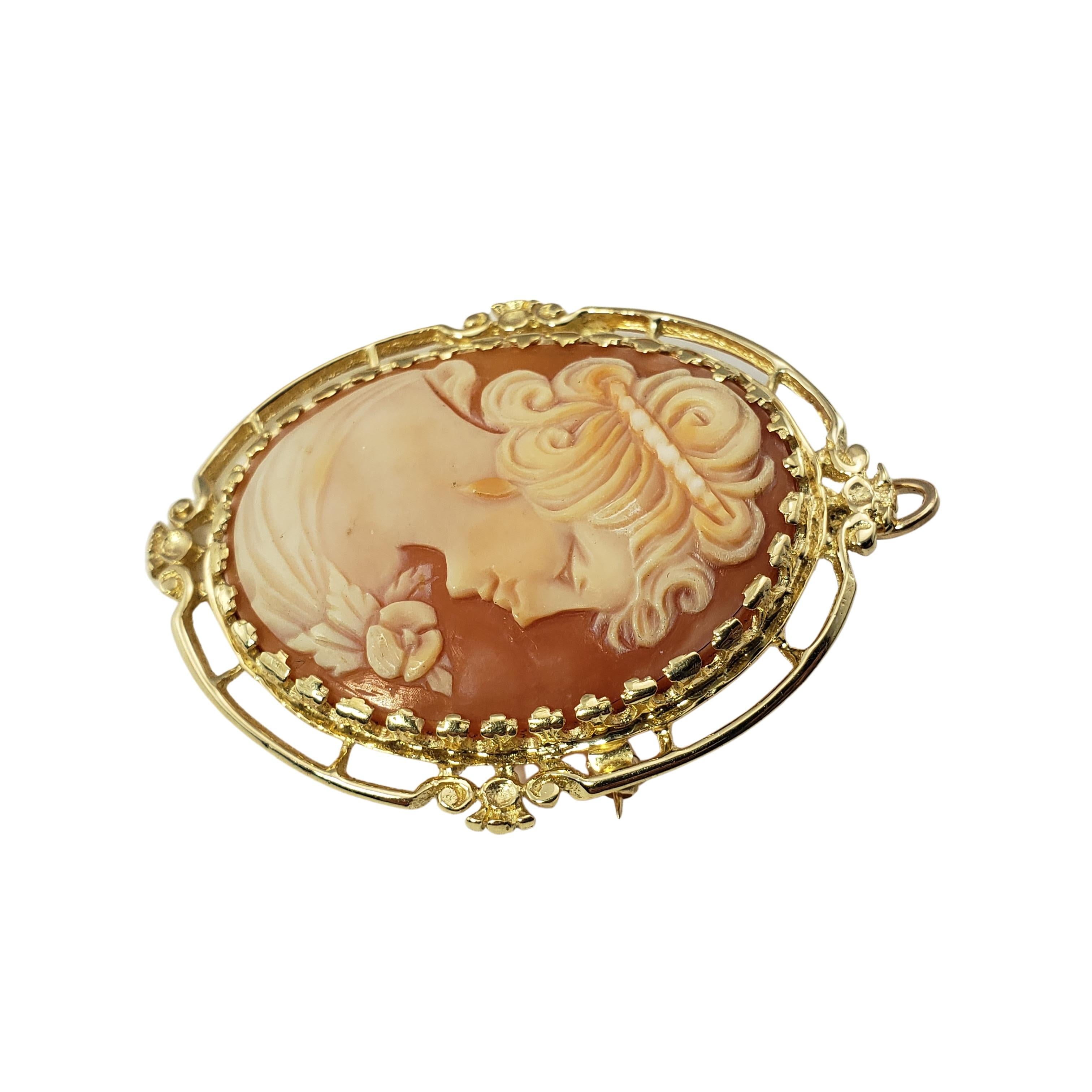 14 Karat Yellow Gold Cameo Brooch/Pendant-

This elegant cameo features a lovely lady in profile set in beautifully detailed 14K yellow gold.  Can be worn as a brooch or a pendant.

Size: 49 mm x 36 mm

Weight:  7.1 dwt. /  11.1 gr.

Stamped: