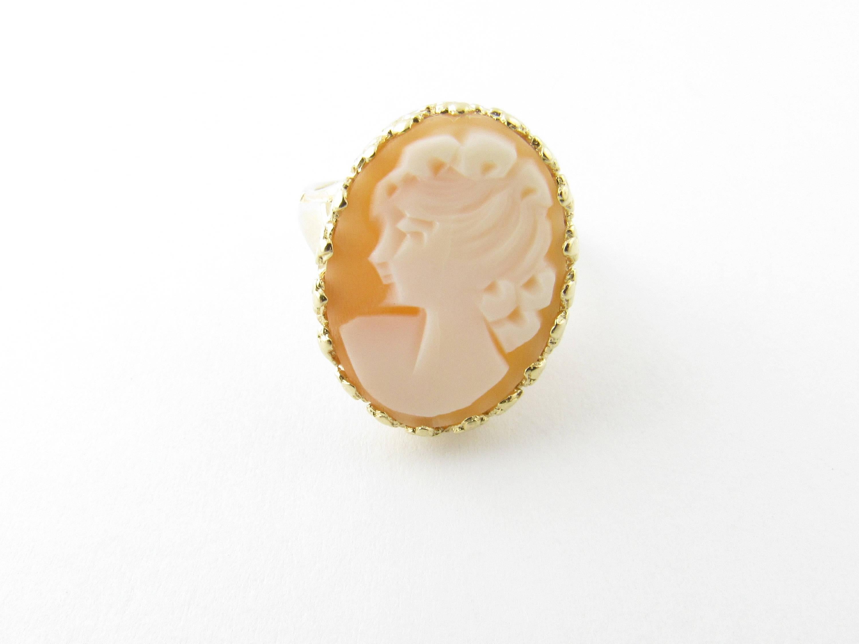 Vintage 14 Karat Yellow Gold Cameo Ring Size 7.25- 
This stunning cameo ring features a lovely lady in profile set in beautifully detailed 14K yellow gold. Top of ring measures 18 mm x 15 mm. Shank measures 2 mm. 
Ring Size: 7.25 
Weight:  4.6 dwt.