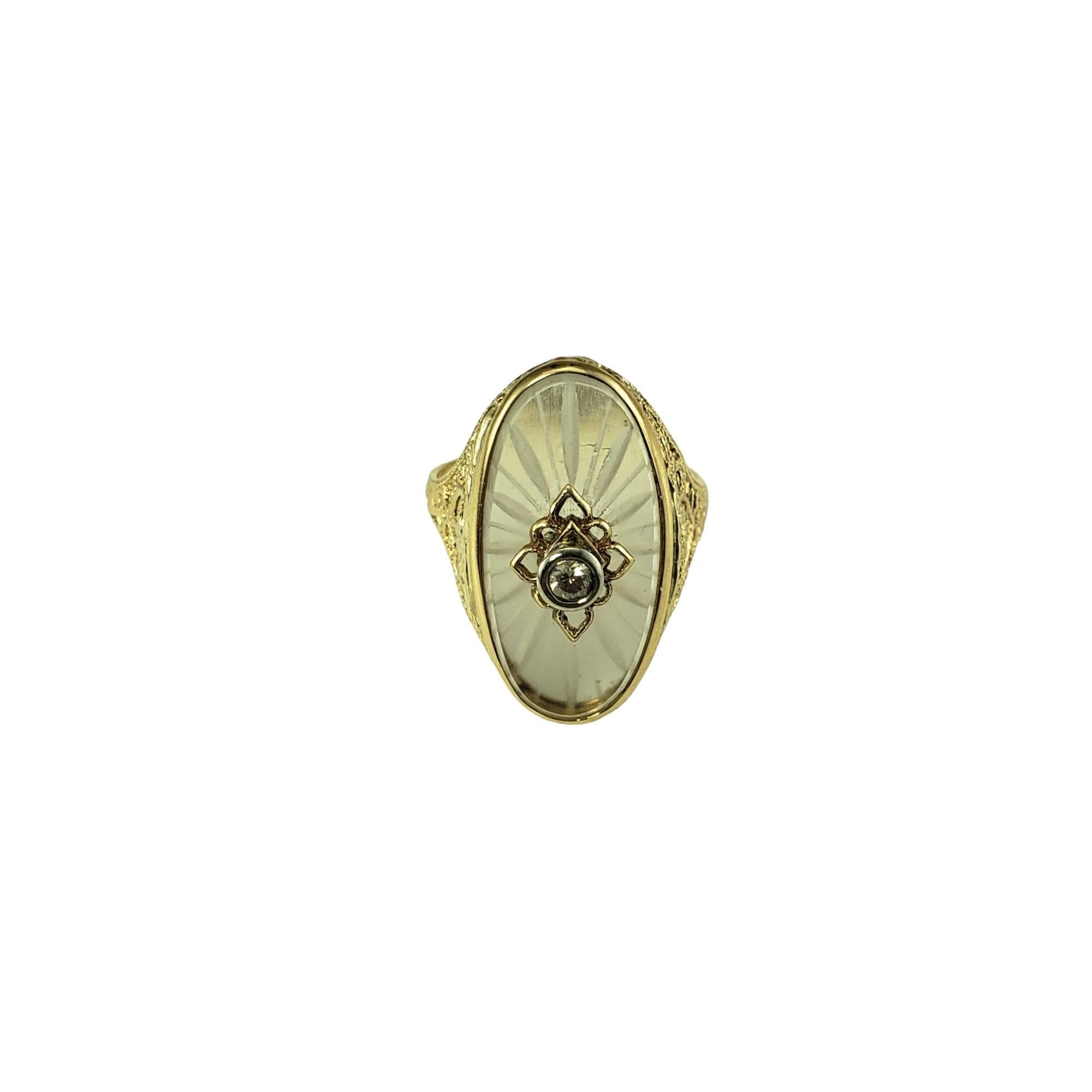 Vintage 14K Yellow Gold Camphor Glass and Diamond Ring Size 5.75-

This elegant ring features cut camphor glass and one round brilliant cut diamond set in beautifully detailed yellow gold.  Top of ring measures 20 mm x 13 mm.  Shank: 2