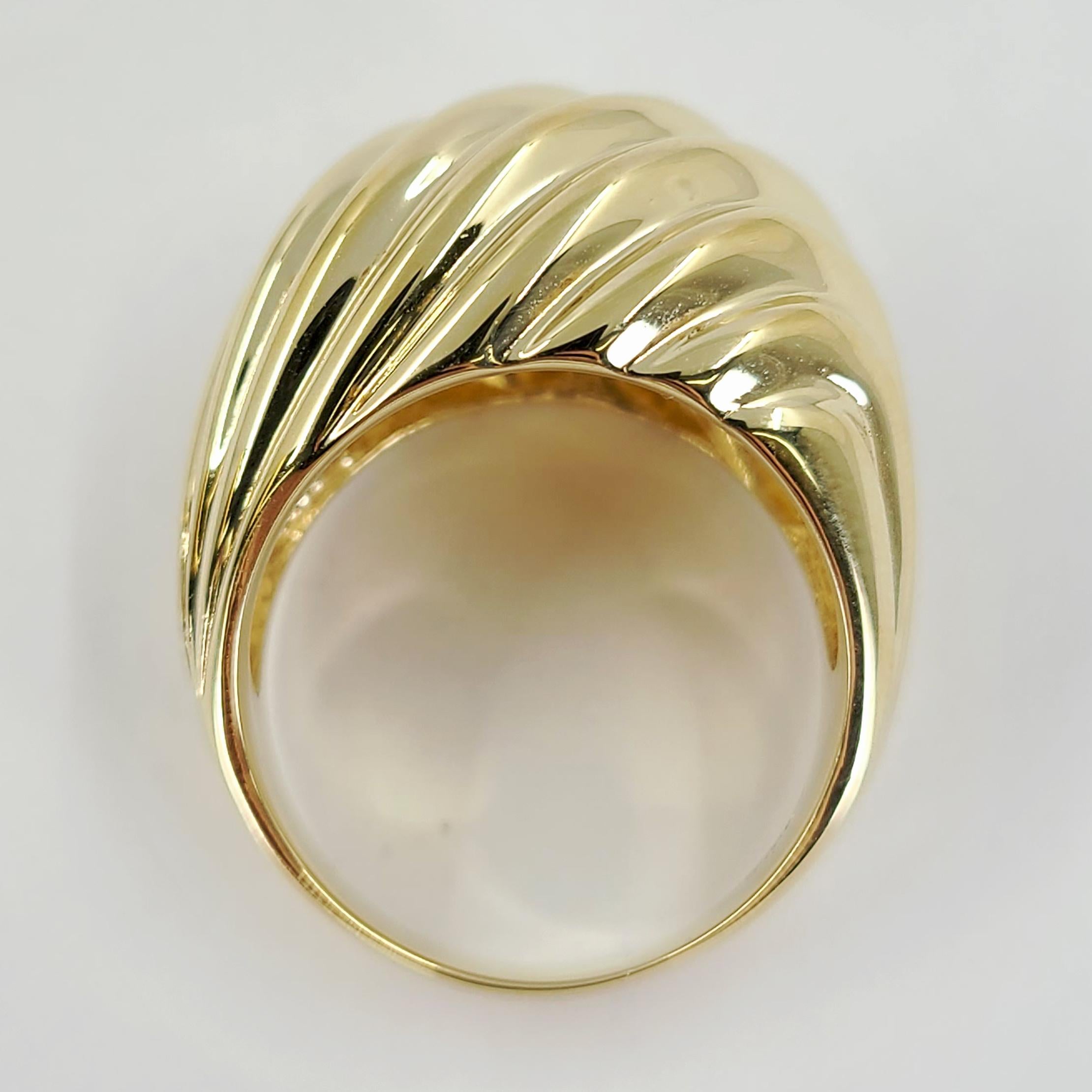14 Karat Yellow Gold Ring Featuring A Domed Wave Design. Finished Weight Is 11.7 Grams. Finger Size 7.25; Purchase Includes One Sizing Upon Request.
