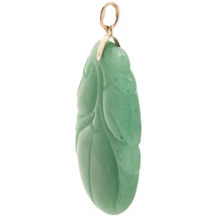 14 Karat Yellow Gold Carved Jade Pendant