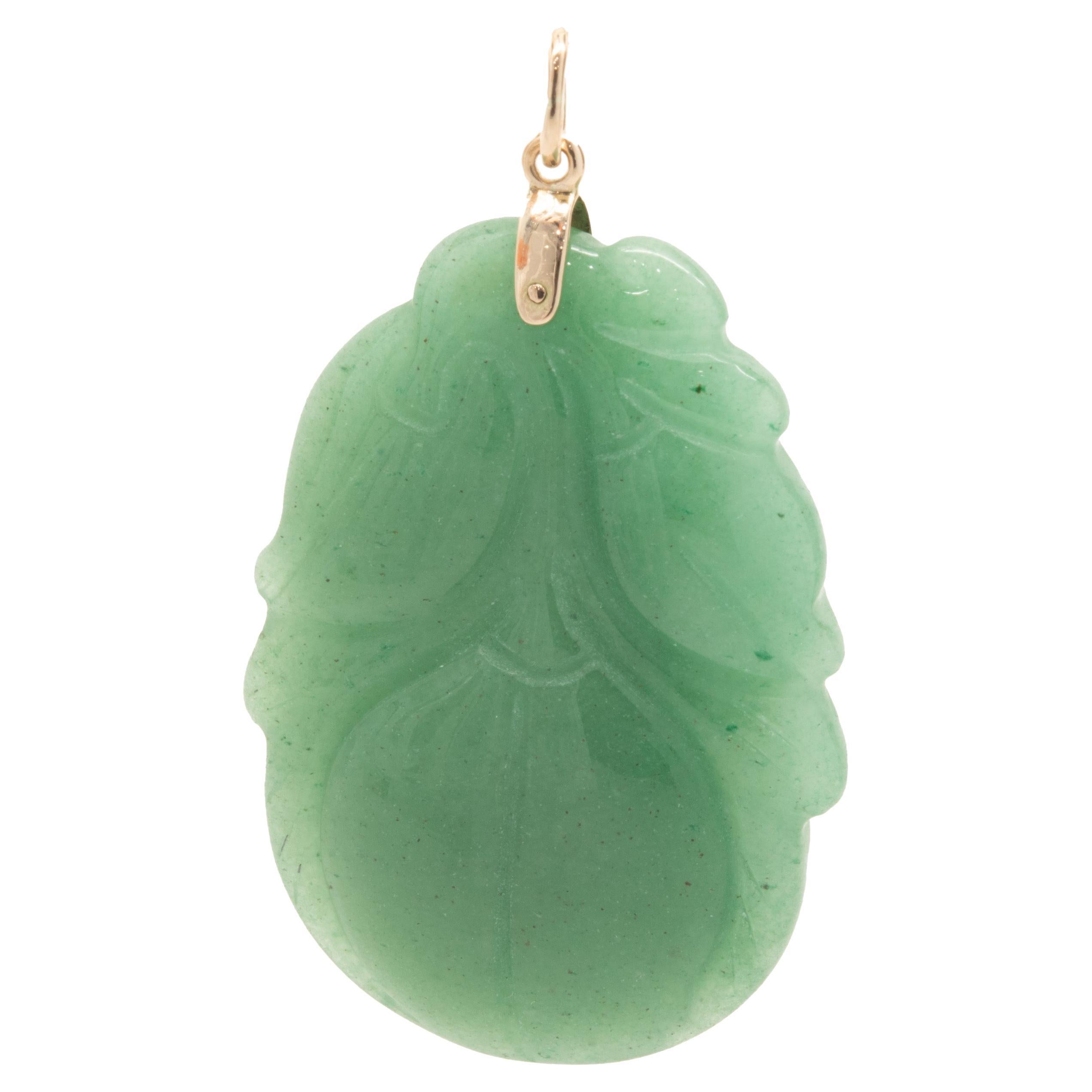 14 Karat Yellow Gold Carved Jade Pendant For Sale