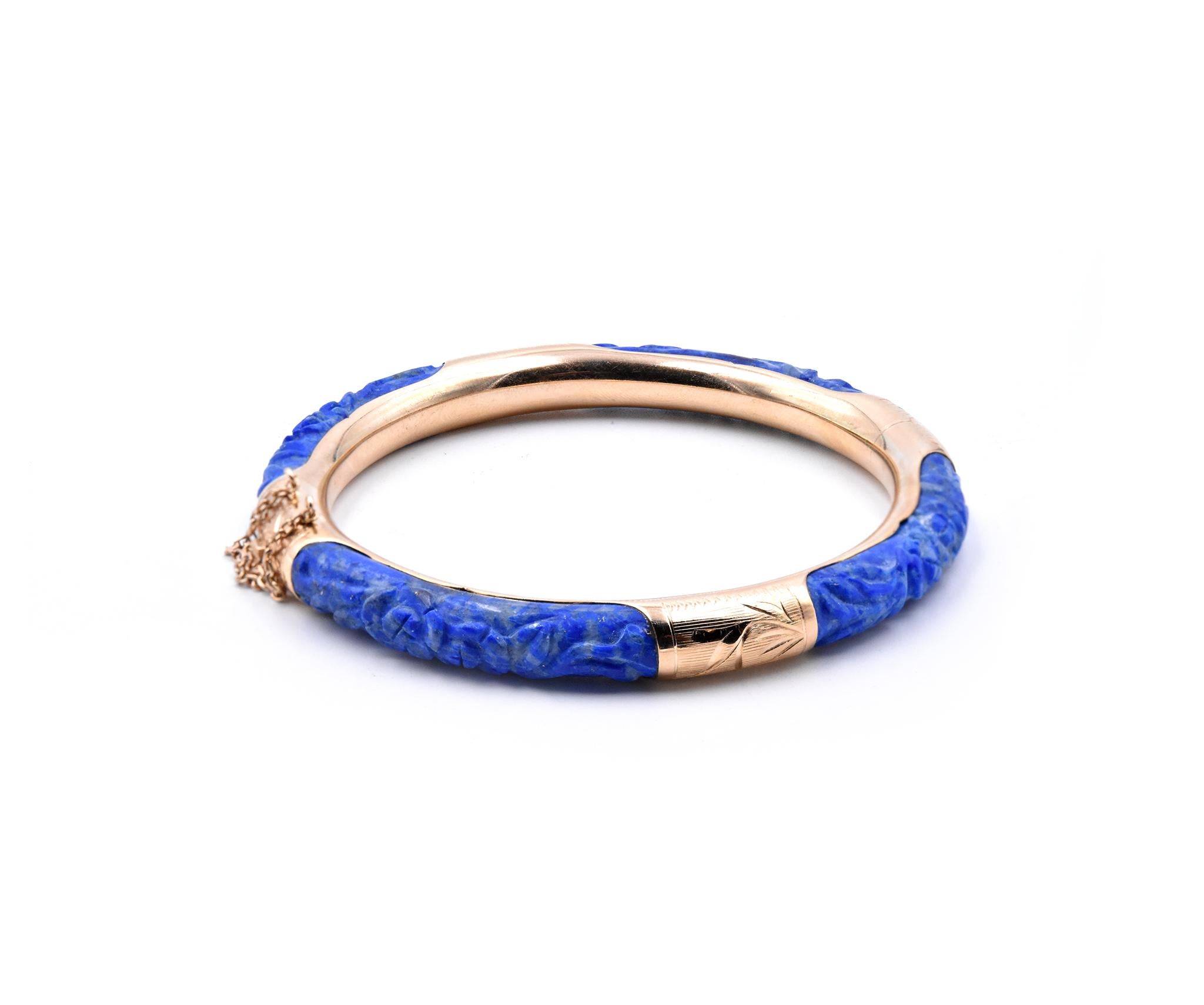 Designer: custom
Material: 14K yellow gold
Dimensions: bracelet will fit a 7-inch wrist 
Weight: 27.61 grams
