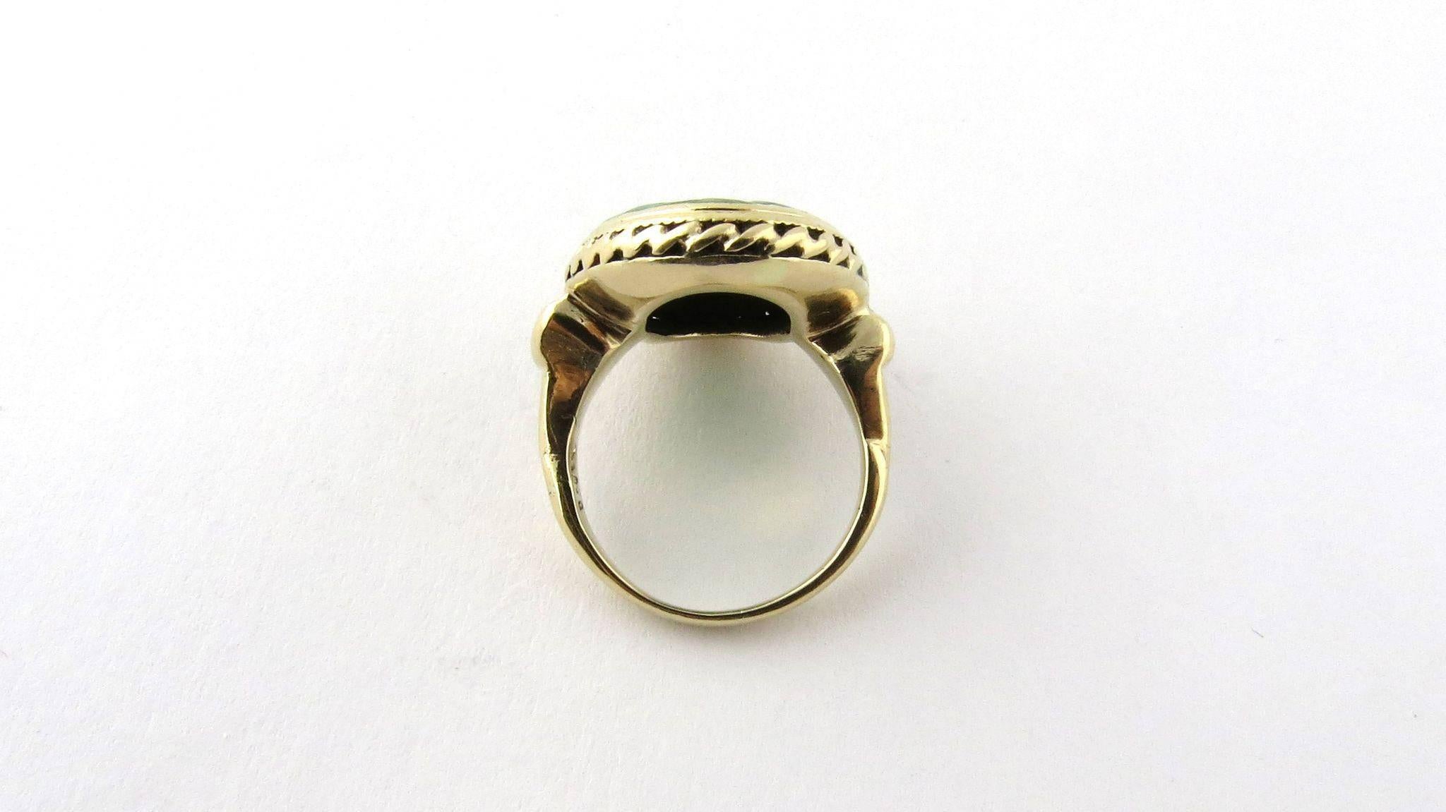 Mixed Cut 14 Karat Yellow Gold Carved Oval Jade Ring