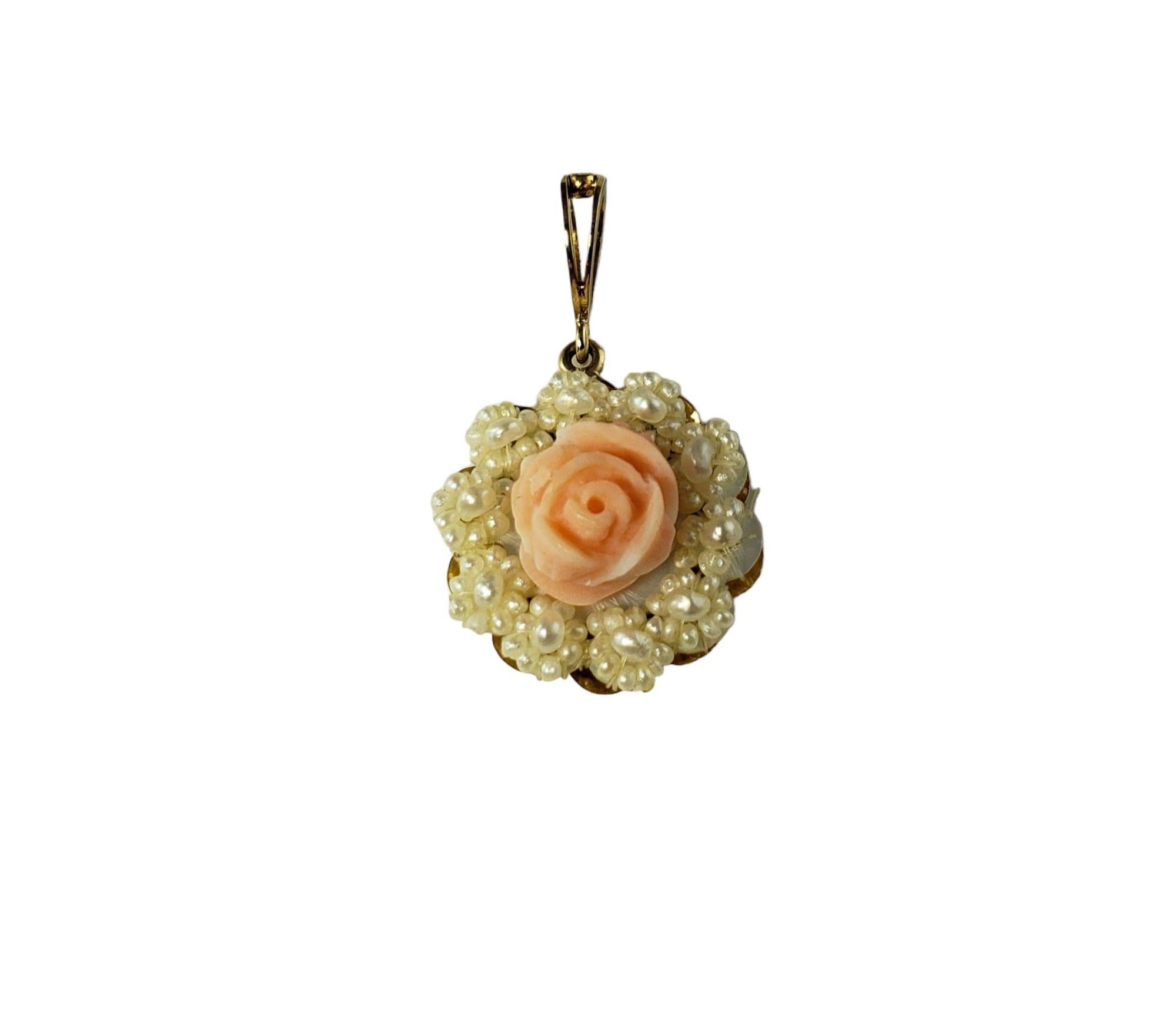 Vintage 14 Karat Yellow Gold Carved Rose and Seed Pearl Pendant-

This beautiful pendant features a lovely carved pink rose surrounded by seed pearls strung into a floral design set in 14K yellow gold.

*Chain not included.

Size: 16 mm x 14