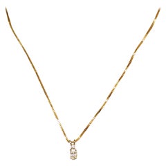 14 Karat Yellow Gold Chain with Prong Set of Oval and Round Diamond Drops