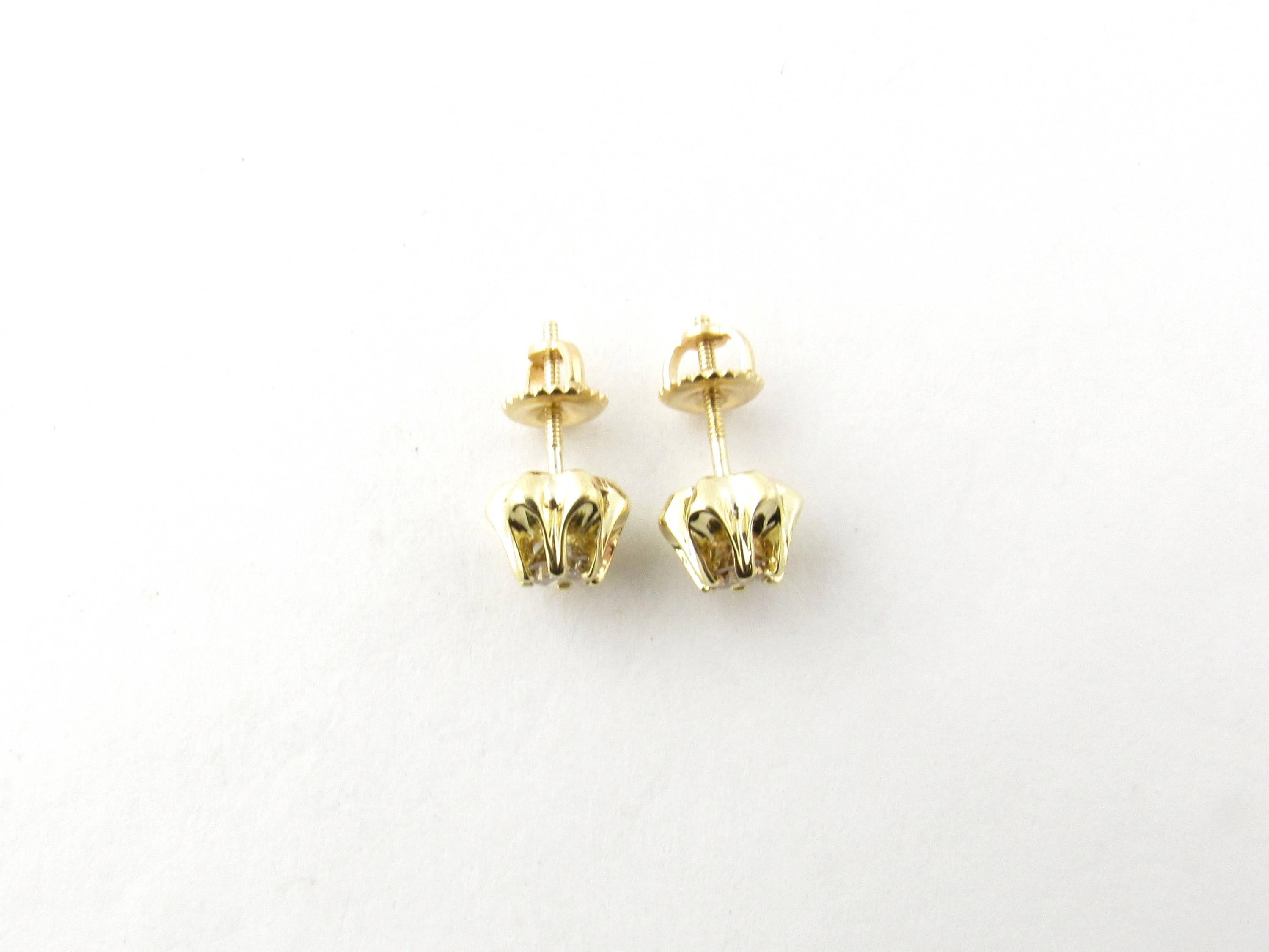 Vintage 14 Karat Yellow Gold Champagne Diamond Earrings

These sparkling earrings each feature one round brilliant cut champagne diamond set in beautifully detailed 14K yellow gold. Screw back closures.

Approximate total diamond weight: .60