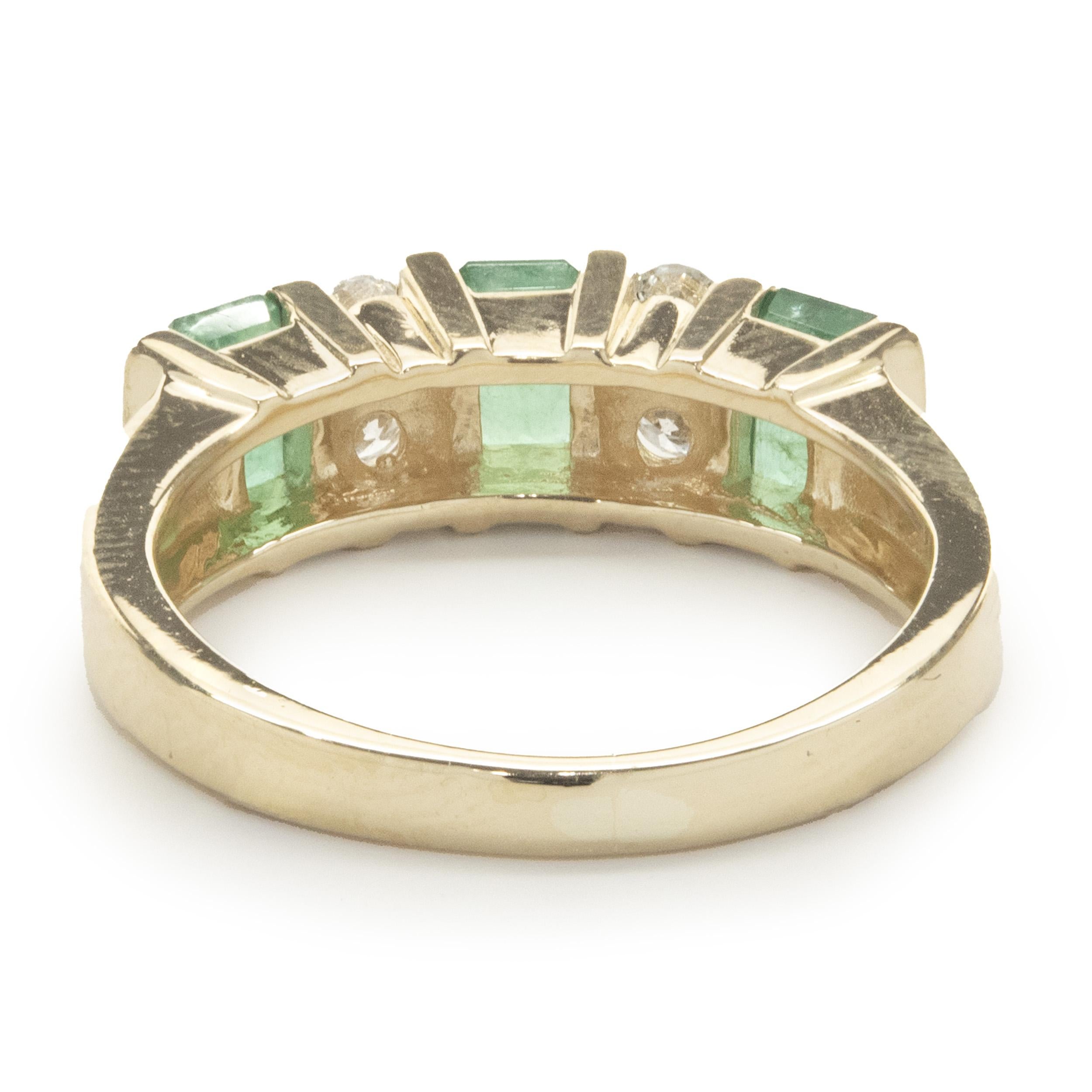 Baguette Cut 14 Karat Yellow Gold Channel Set Alternating Diamond and Emerald Ring