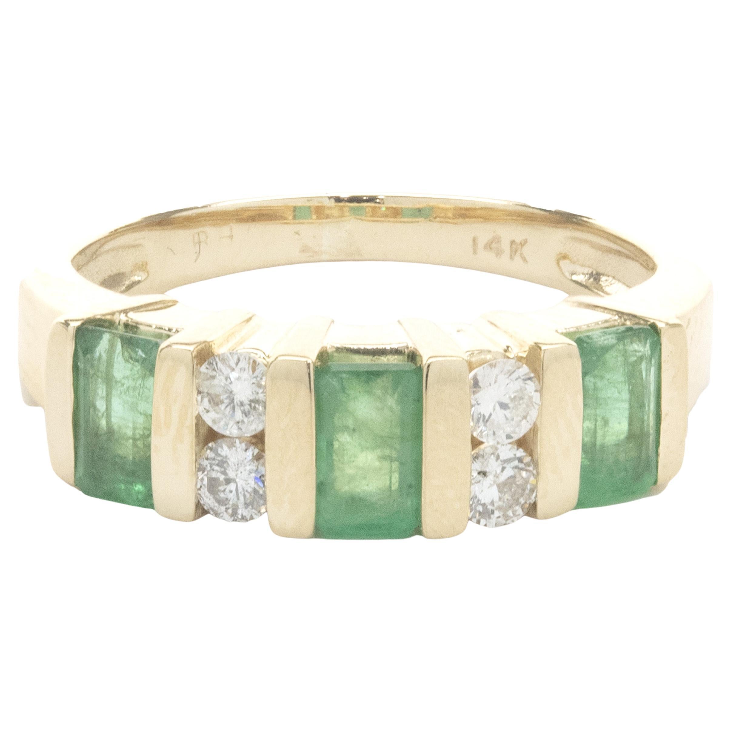 14 Karat Yellow Gold Channel Set Alternating Diamond and Emerald Ring