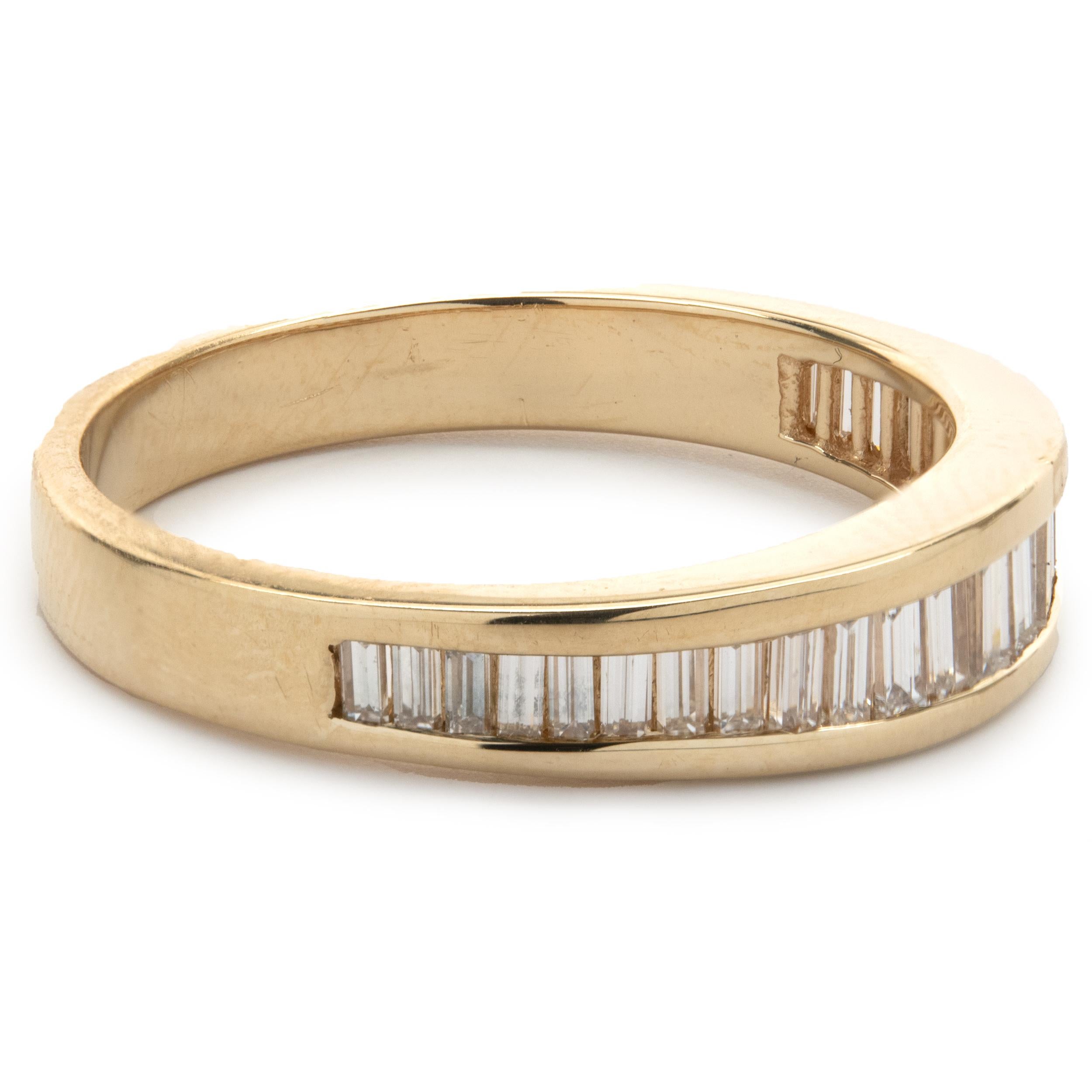 Designer: custom
Material: 14K yellow gold
Diamond: 26 baguette cut = 0.78cttw
Color: G 
Clarity: SI1
Ring size: 10.5 (please allow two additional shipping days for sizing requests)
Weight: 4.65 grams
