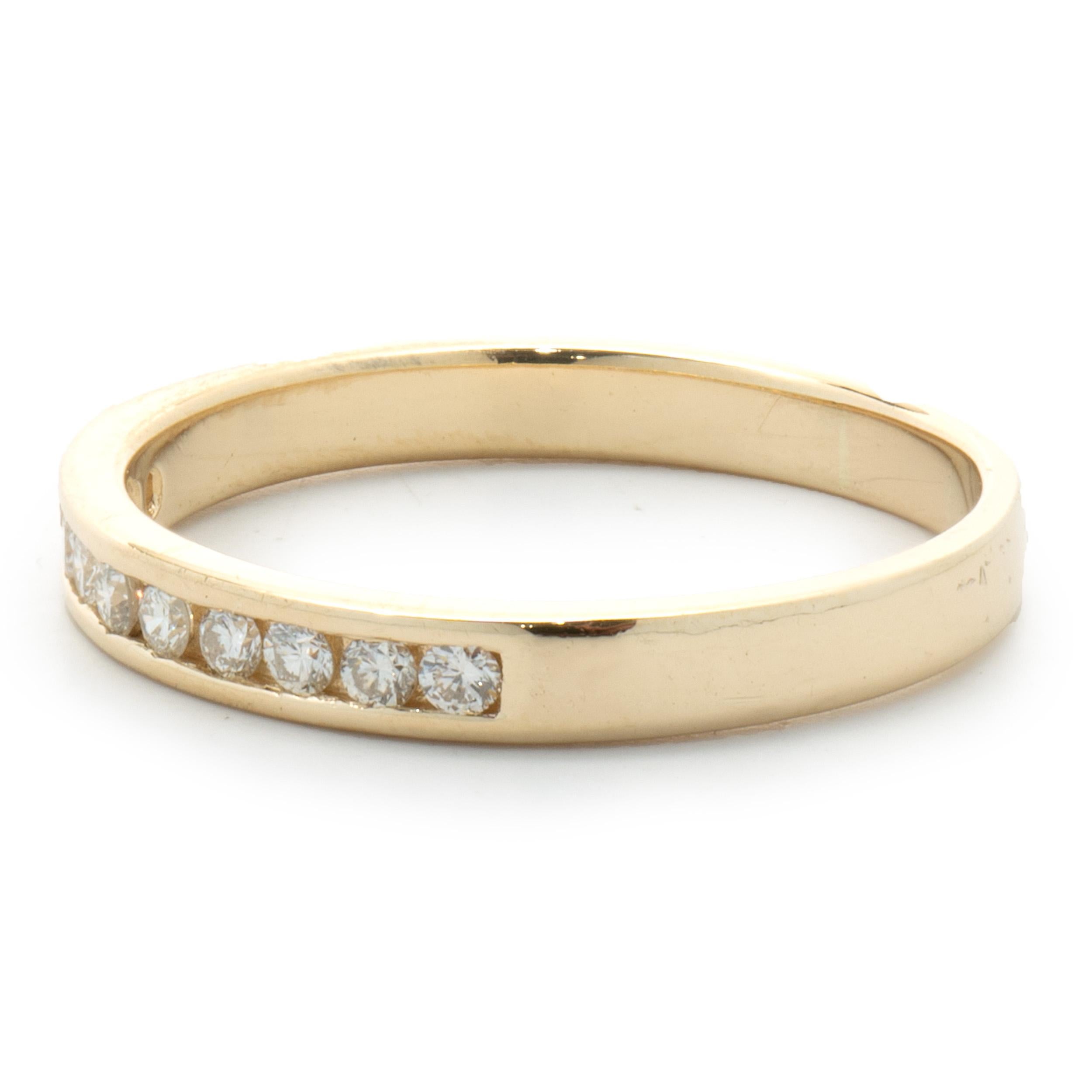 Designer: Custom
Material: 14K yellow gold
Diamonds: 10 round brilliant cut = 0.15cttw
Color: I
Clarity: SI1-2
Size: 7.75 sizing available 
Dimensions: ring measures 2.8mm in width
Weight: 2.36 grams