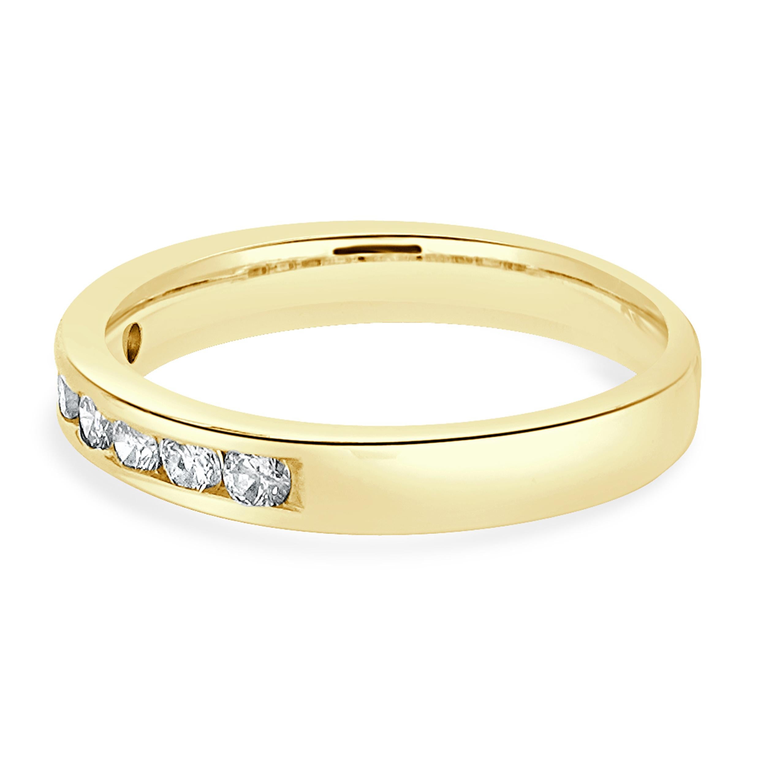 Designer: custom
Material: 14K yellow gold
Diamond: 7 round brilliant cut = 0.21cttw
Color: J
Clarity: I1
Ring size: 4.5 (please allow two additional shipping days for sizing requests)
Weight: 2.16 grams