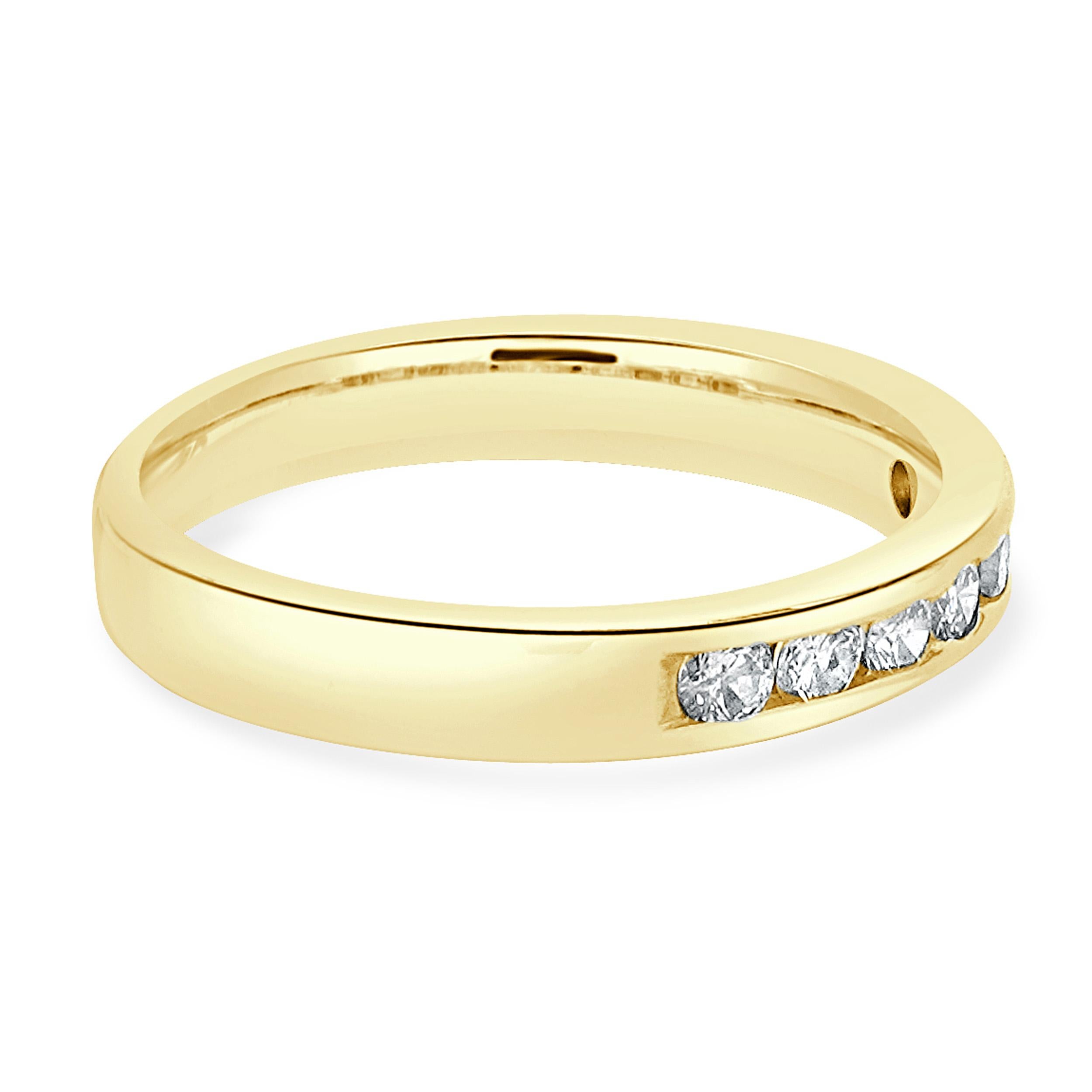 Round Cut 14 Karat Yellow Gold Channel Set Diamond Band For Sale