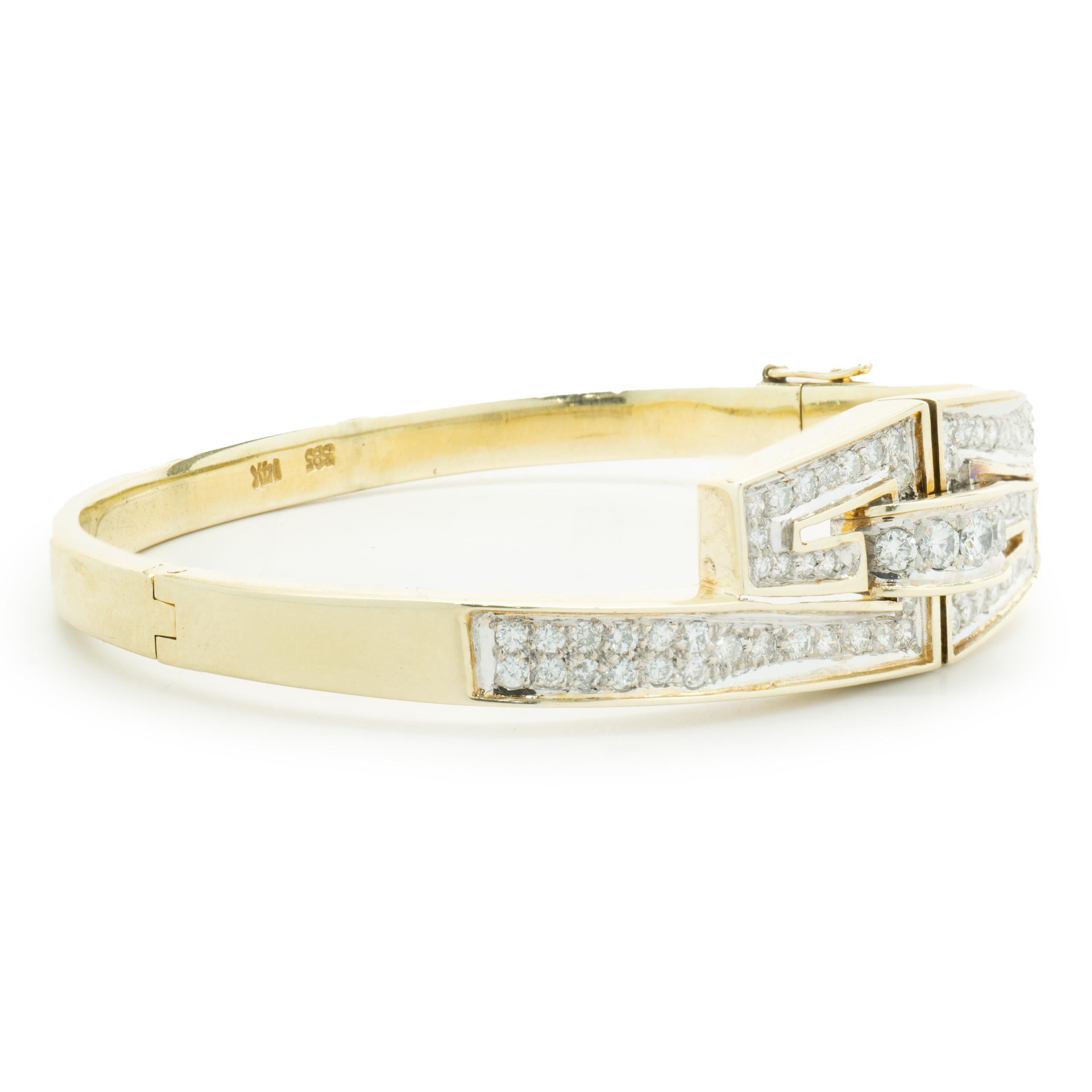 Designer: custom design
Material: 14K yellow gold
Diamonds: 71 round cut = 1.50cttw
Color: G 
Clarity: SI1-2
Dimensions: bracelet measures 7-inches in diameter 
Weight: 26.26 grams