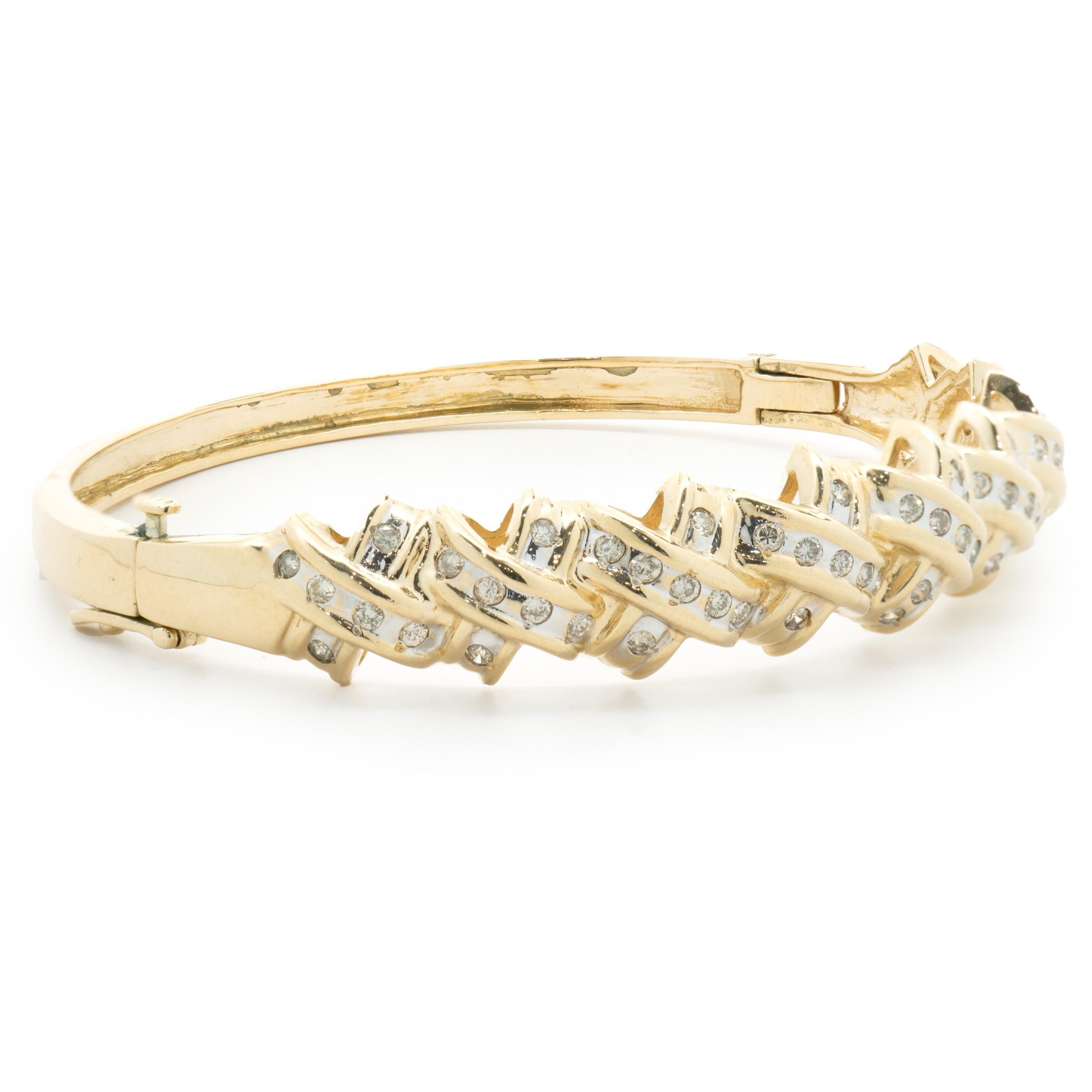 Designer: custom design
Material: 14K yellow gold
Diamonds: 54 round brilliant cut = 0.54cttw
Color: H
Clarity: SI2
Dimensions: bracelet will fit up to a 6.5-inch wrist
Weight: 21.88 grams