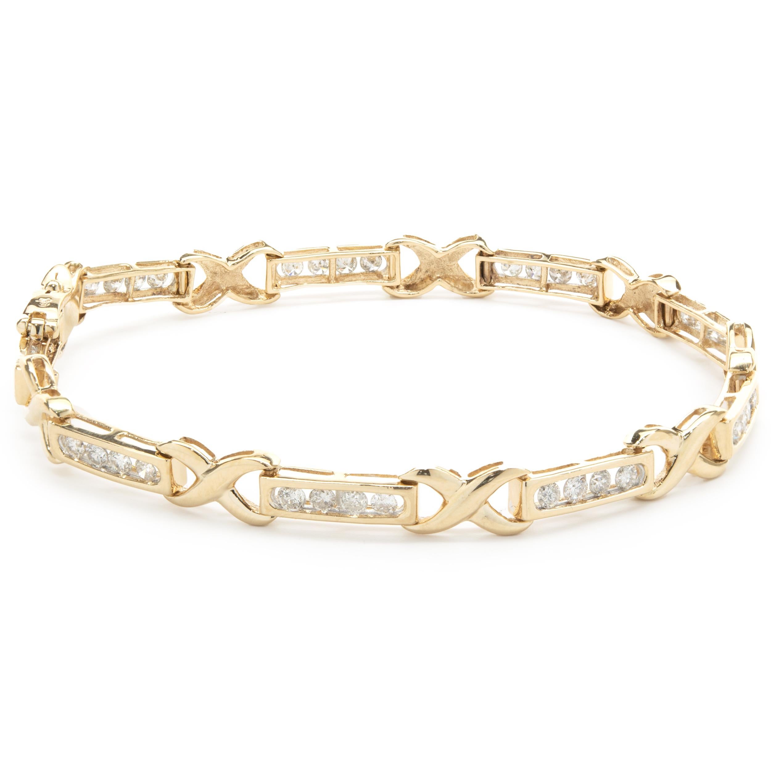 Designer: custom 
Material: 14K yellow gold
Diamond: 36 round brilliant cut = 1.80cttw
Color:  H/I
Clarity: SI1
Dimensions: bracelet will fit up to a 7-inch wrist
Weight: 10.43 grams