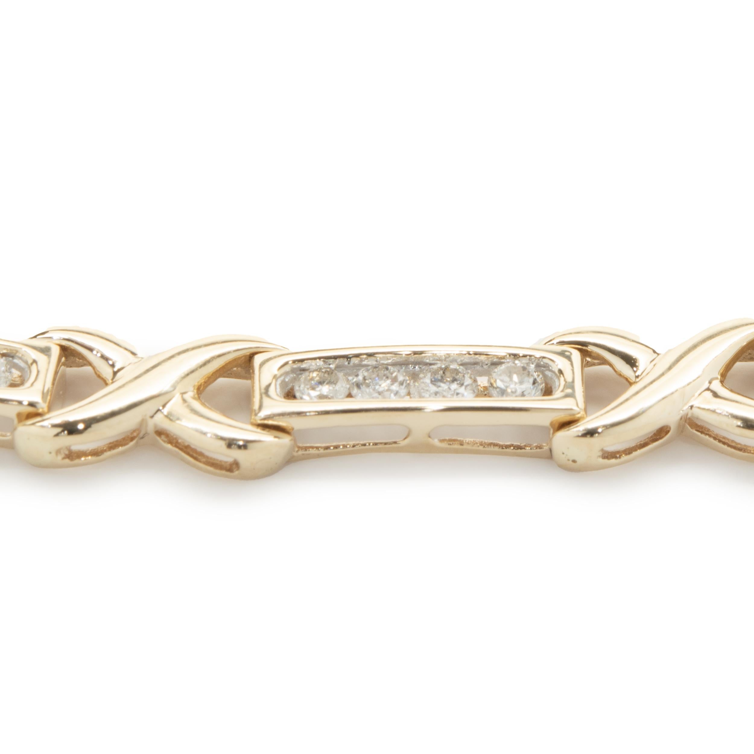 14 Karat Yellow Gold Channel Set Diamond X Tennis Bracelet In Excellent Condition For Sale In Scottsdale, AZ