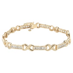 Bracelet tennis en or jaune 14 carats avec diamants en forme de canal et diamants