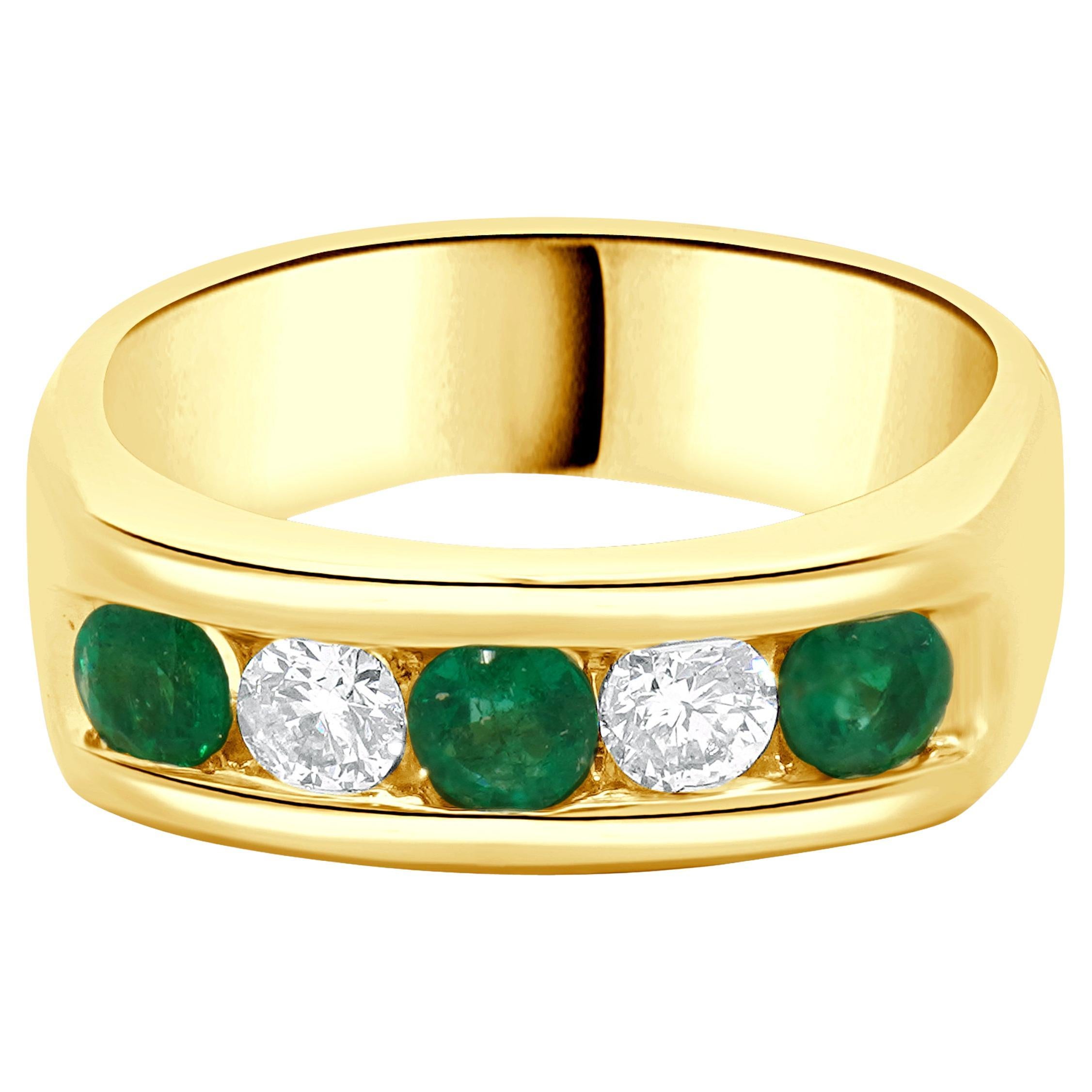 14 Karat Yellow Gold Channel Set Emerald and Diamond Ring