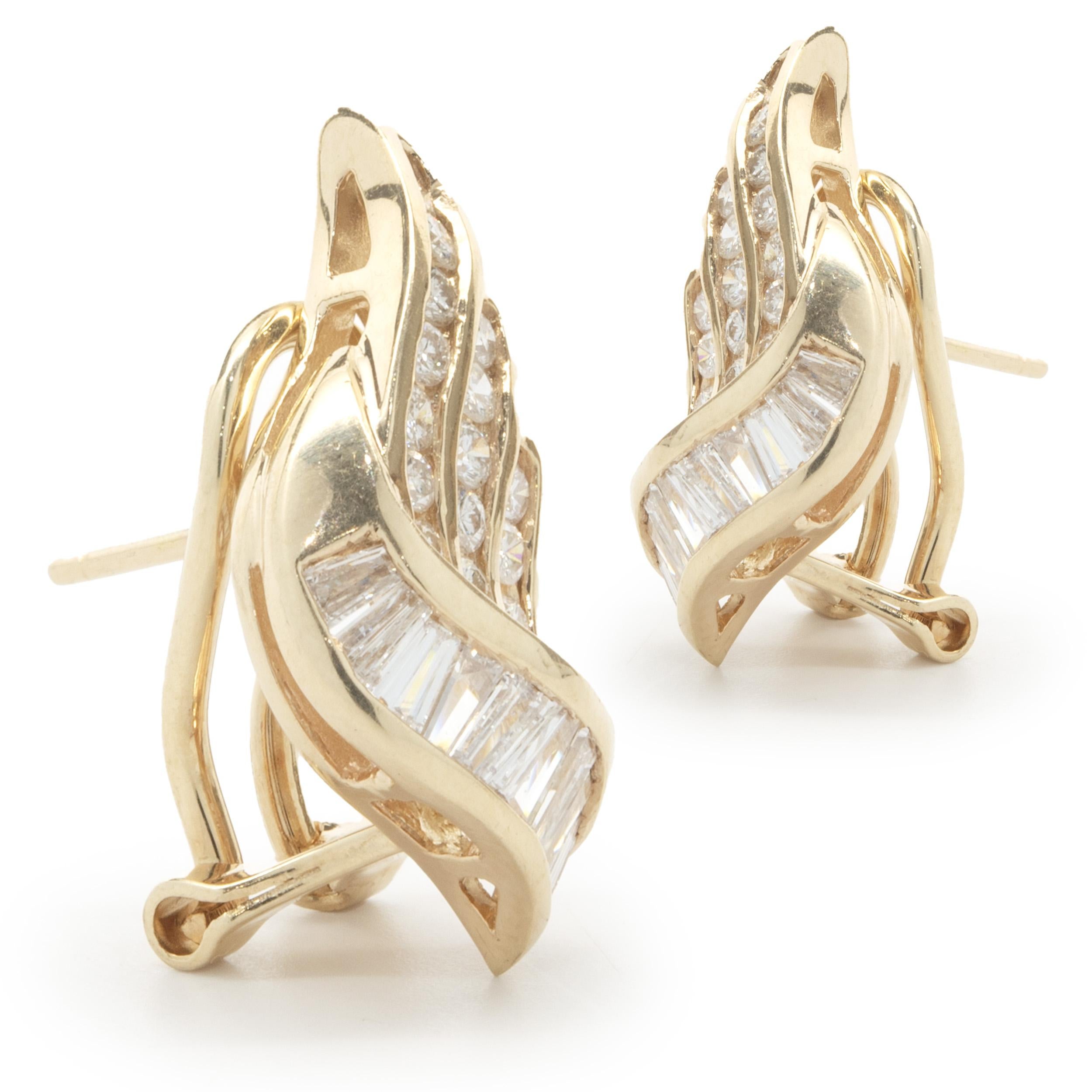 Designer: custom design
Material: 14K yellow gold
Diamonds: 50 round and baguette cut = 1.00cttw
Color: G
Clarity: SI1
Dimensions: earrings measure 22mm wide
Weight: 6.42 grams
