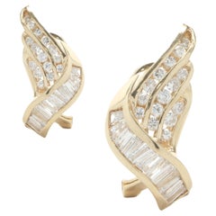 14 Karat Yellow Gold Channel Set Round and Baguette Diamond Wing Earrings