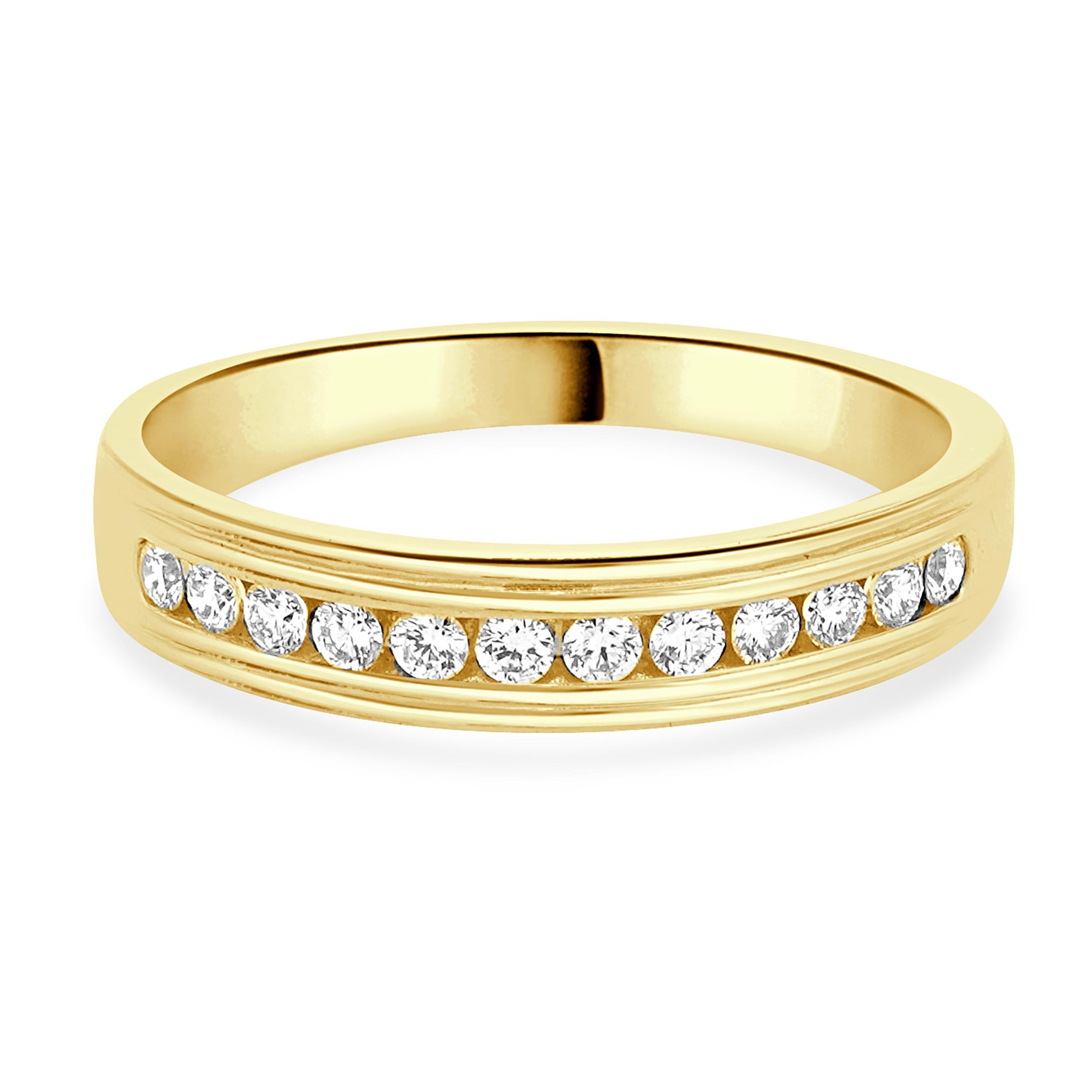 Designer: custom
Material: 14k yellow gold
Diamond: 12 round brilliant cut = 0.30cttw
Color: H
Clarity: VS2
Ring size: 7.25 (please allow two additional shipping days for sizing requests)
Dimensions: ring measures 4.38mm wide
Weight: 3.0 grams

