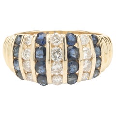 14 Karat Yellow Gold Channel Set Sapphire and Diamond Band