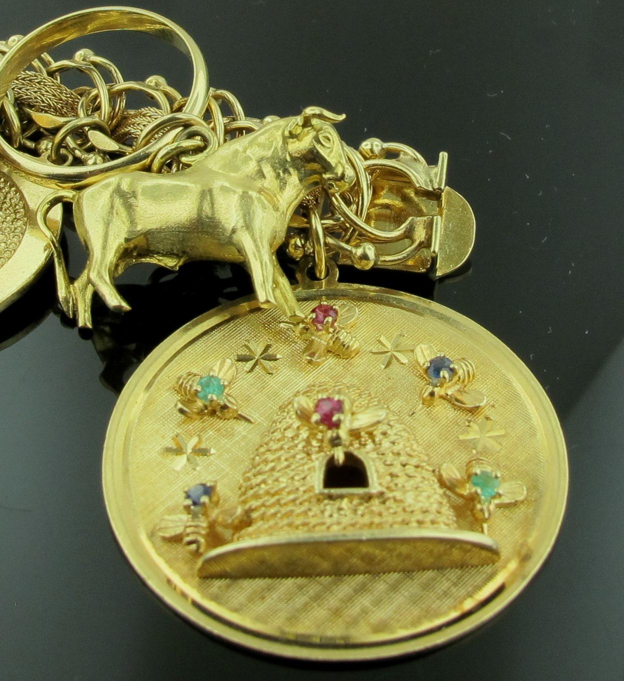 14 Karat Yellow Gold Charm Bracelet with 19 Charms 2