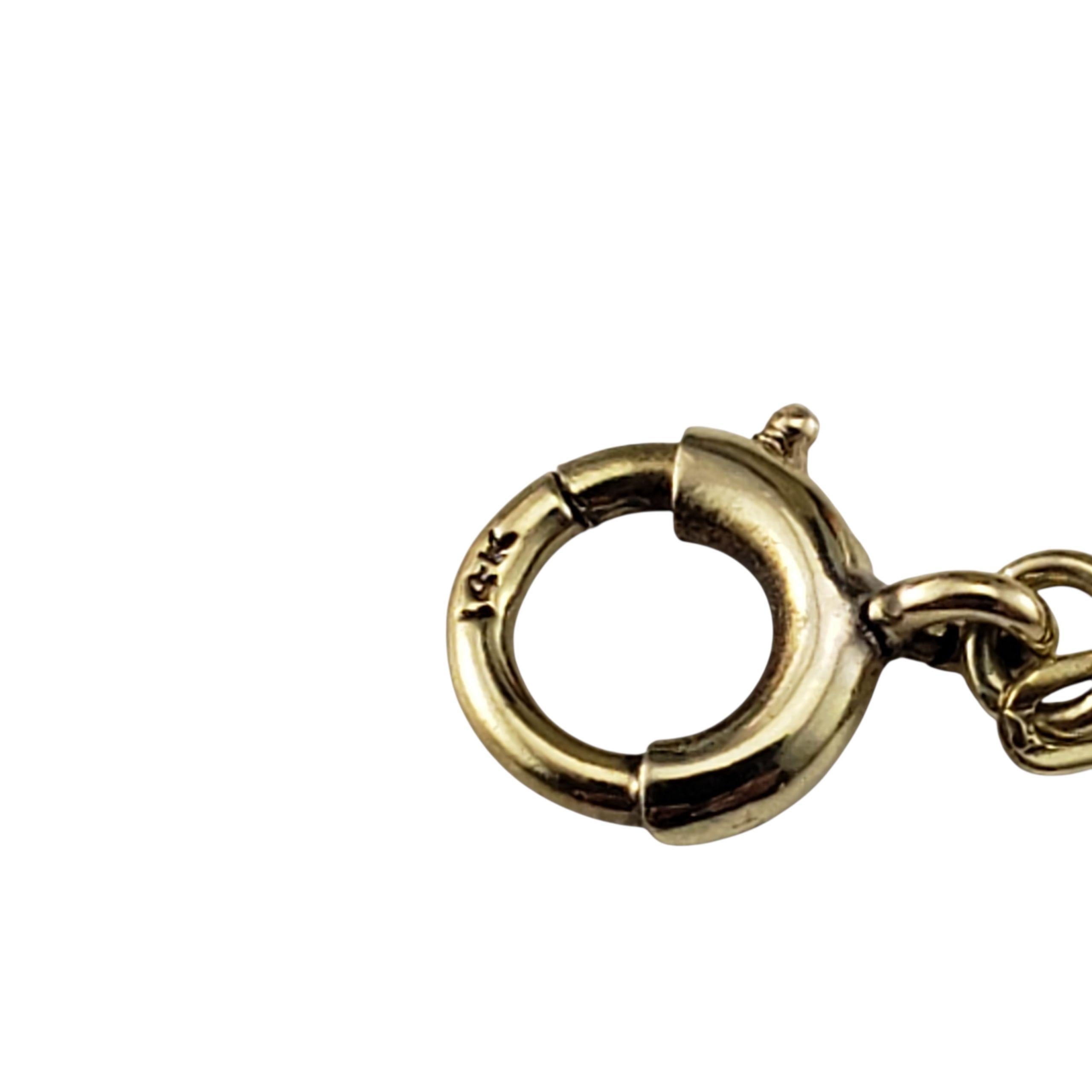 Pulsera de dijes de oro amarillo de 14 quilates con dijes surtidos #22908 en venta 2