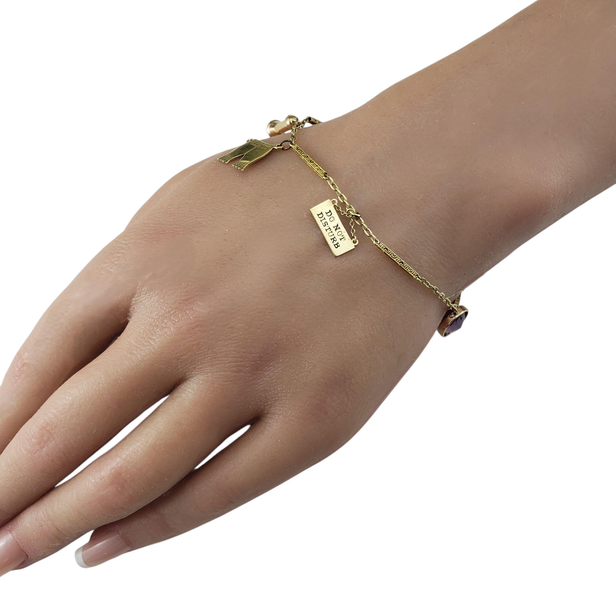 Pulsera de dijes de oro amarillo de 14 quilates con dijes surtidos #22908 en venta 4