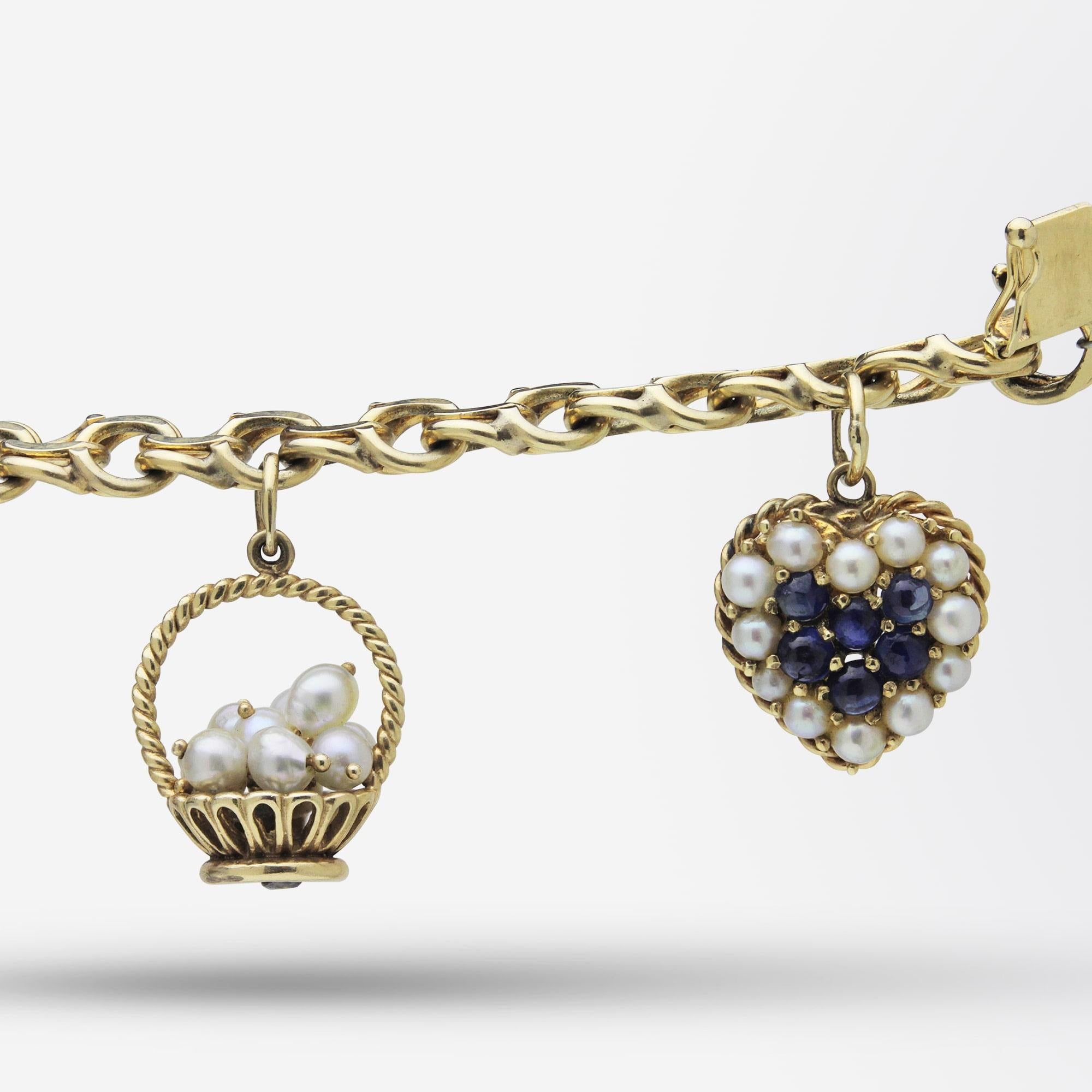 Cabochon 14 Karat Yellow Gold Charm Bracelet with Pearls and Ceylon Sapphires