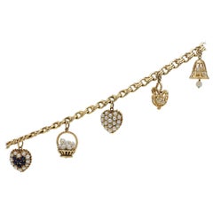 14 Karat Gelbgold Charm-Armband mit Perlen und Ceylon-Saphiren