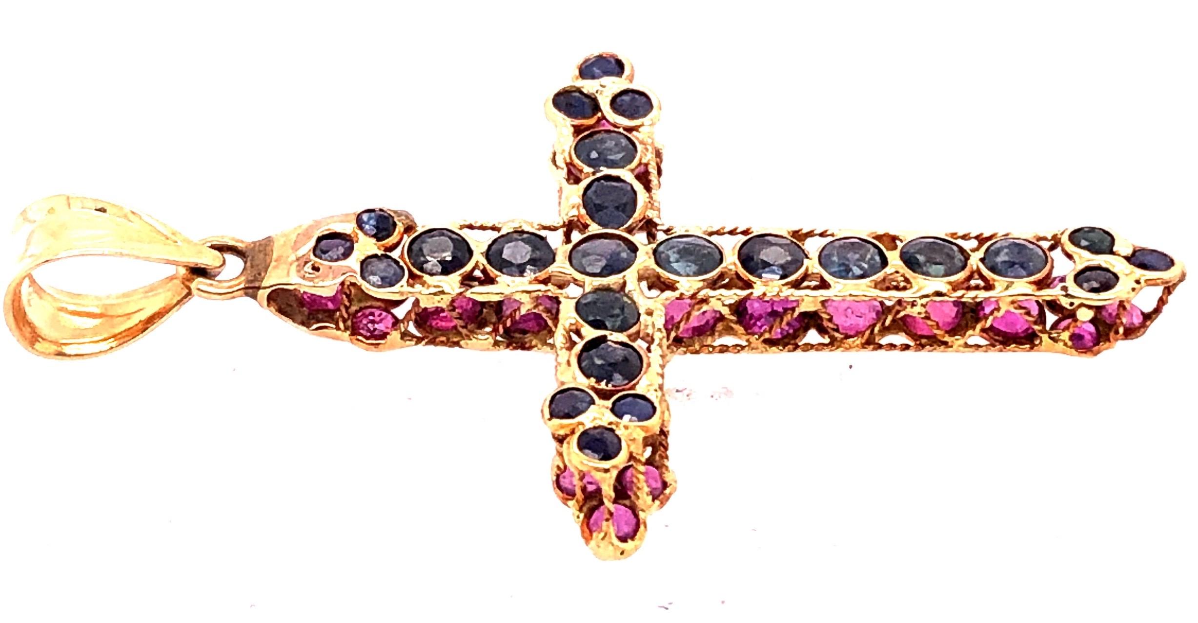 gold cross with rubies