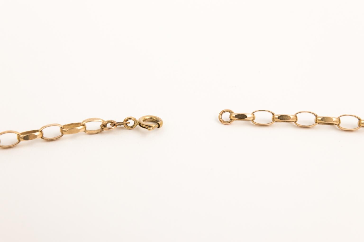 Contemporary 14 Karat Yellow Gold Charm Necklace For Sale
