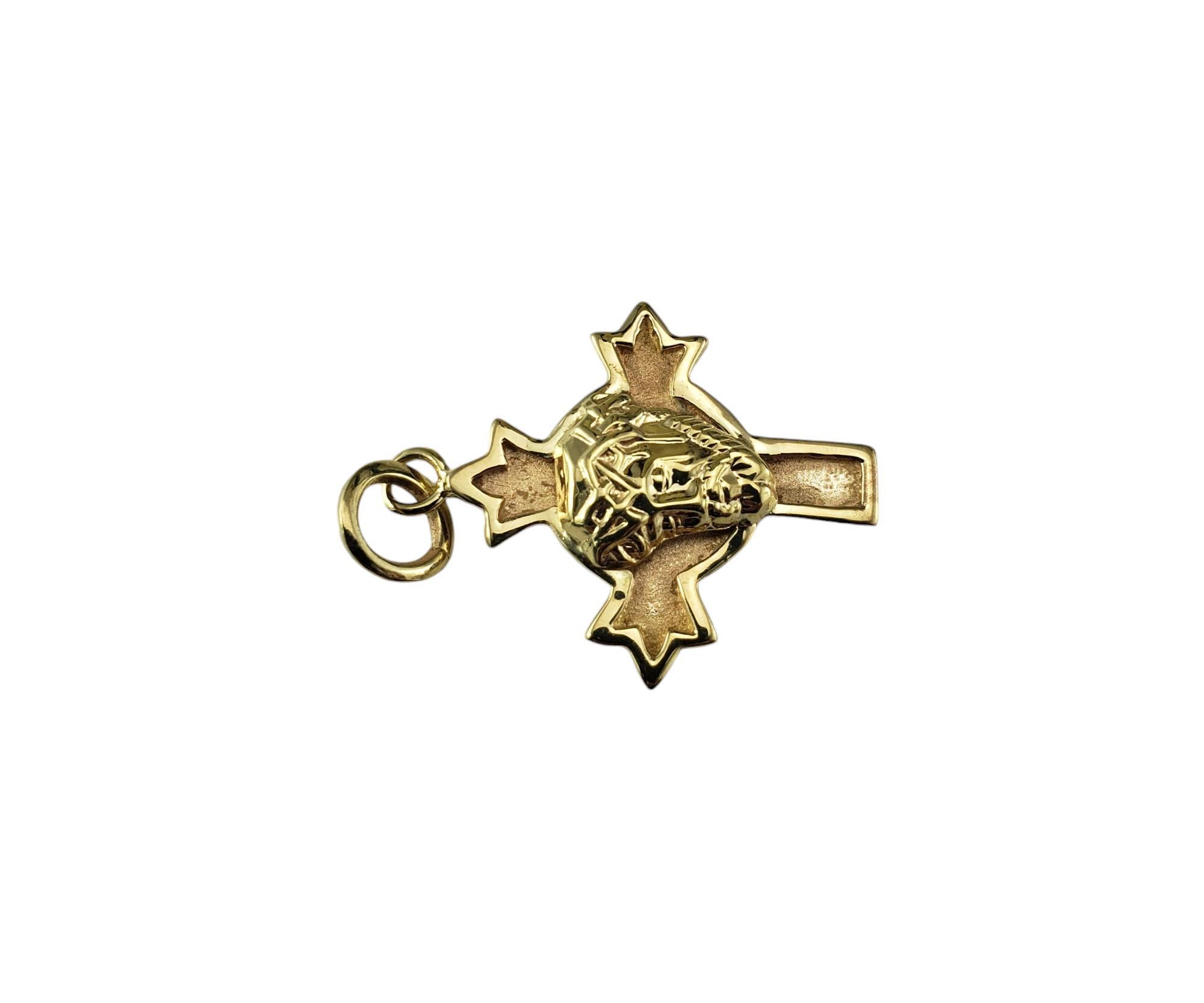 14 Karat Yellow Gold Christ Head Cross Pendant-

This beautifully detailed cross pendant features a 3D Christ head crafted in classic 14K yellow gold.

Tested 14K gold.

Size: 25 mm x 21 mm (excluding bale)

Weight:  1.8 dwt. / 2.8 gr.

*Chain not