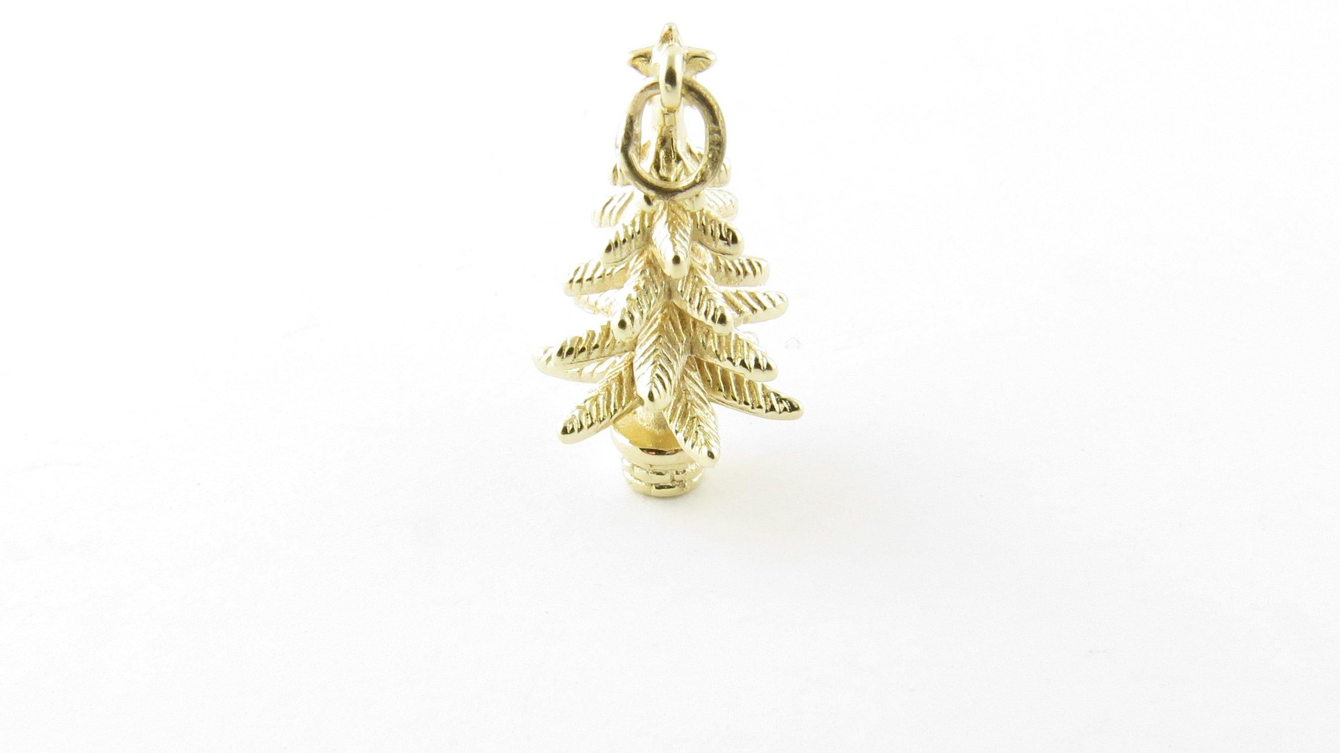 Vintage 14 Karat Yellow Gold Christmas Tree Charm- 'Tis the season! This lovely 3D charm features a miniature holiday tree meticulously detailed in 14K gold. Size: 22 mm x 12 mm (including loops) Weight: 1.9 dwt. / 3.1 gr. Acid tested for 14K gold.