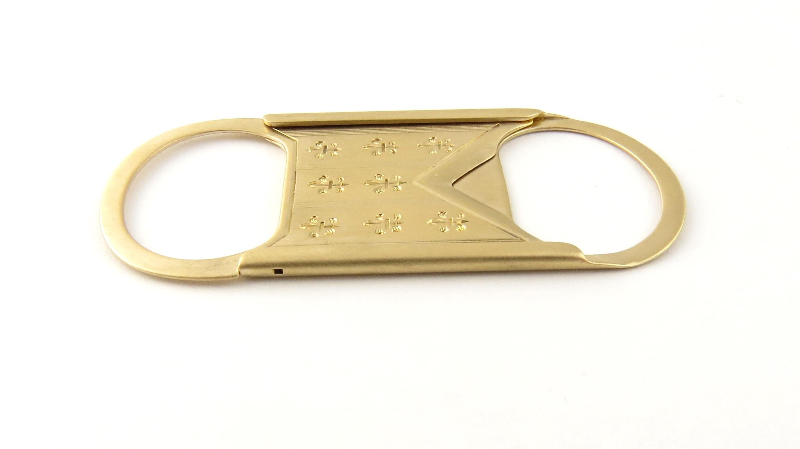 Vintage 14 Karat Yellow Gold Cigar Cutter

This elegant cigar cutter is decorated with fleur de lis and crafted in classic 14K yellow gold.

Size: 53 mm x 24 mm

Weight: 6.3 dwt. / 9.8 gr.

Stamped: 14K

Hallmark: R.S. PATDEC 9 02

Very good