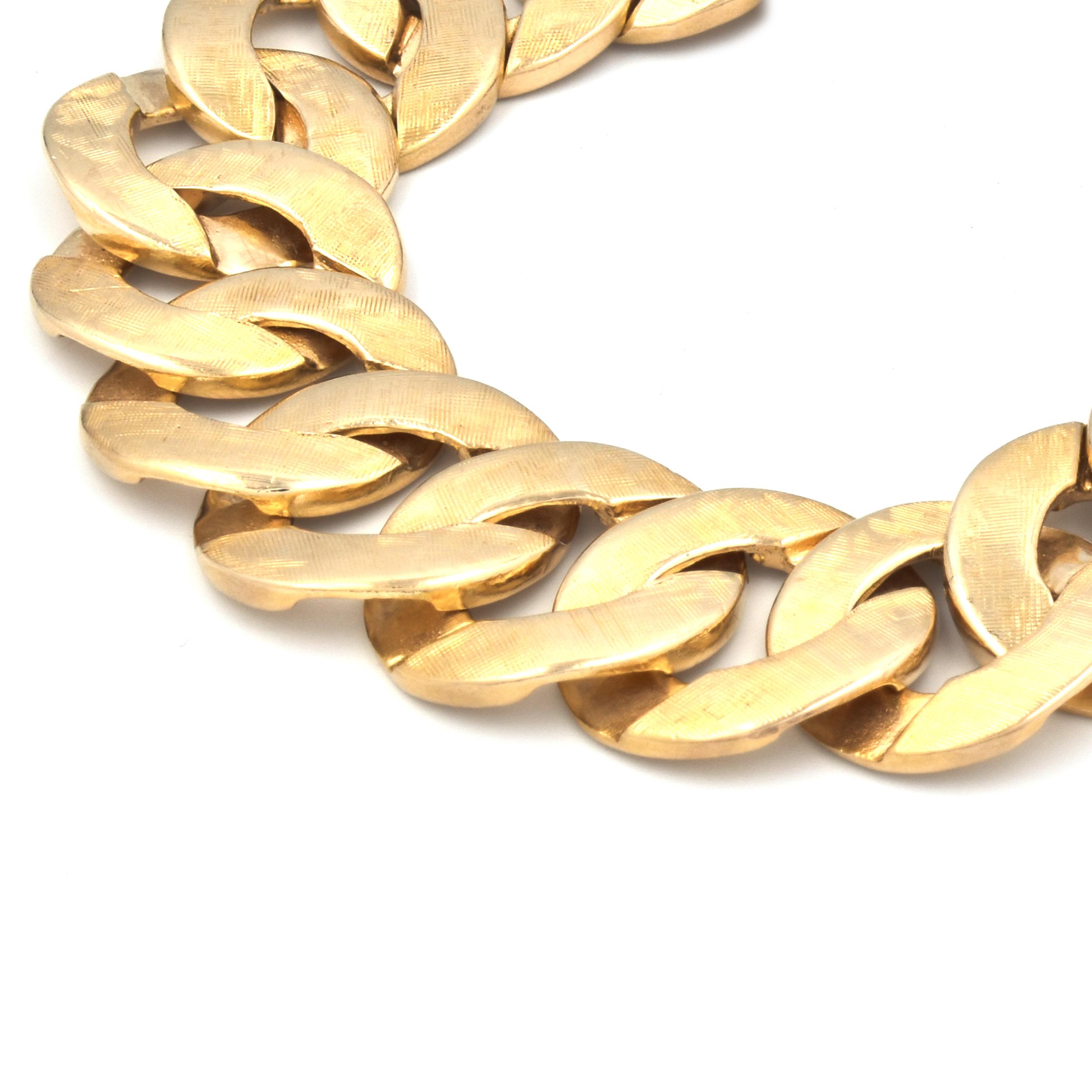 Designer: custom
Material: 14K yellow gold 
Dimensions: bracelet will fit up to a 7.5-inch wrist
Weight: 59.68 grams
