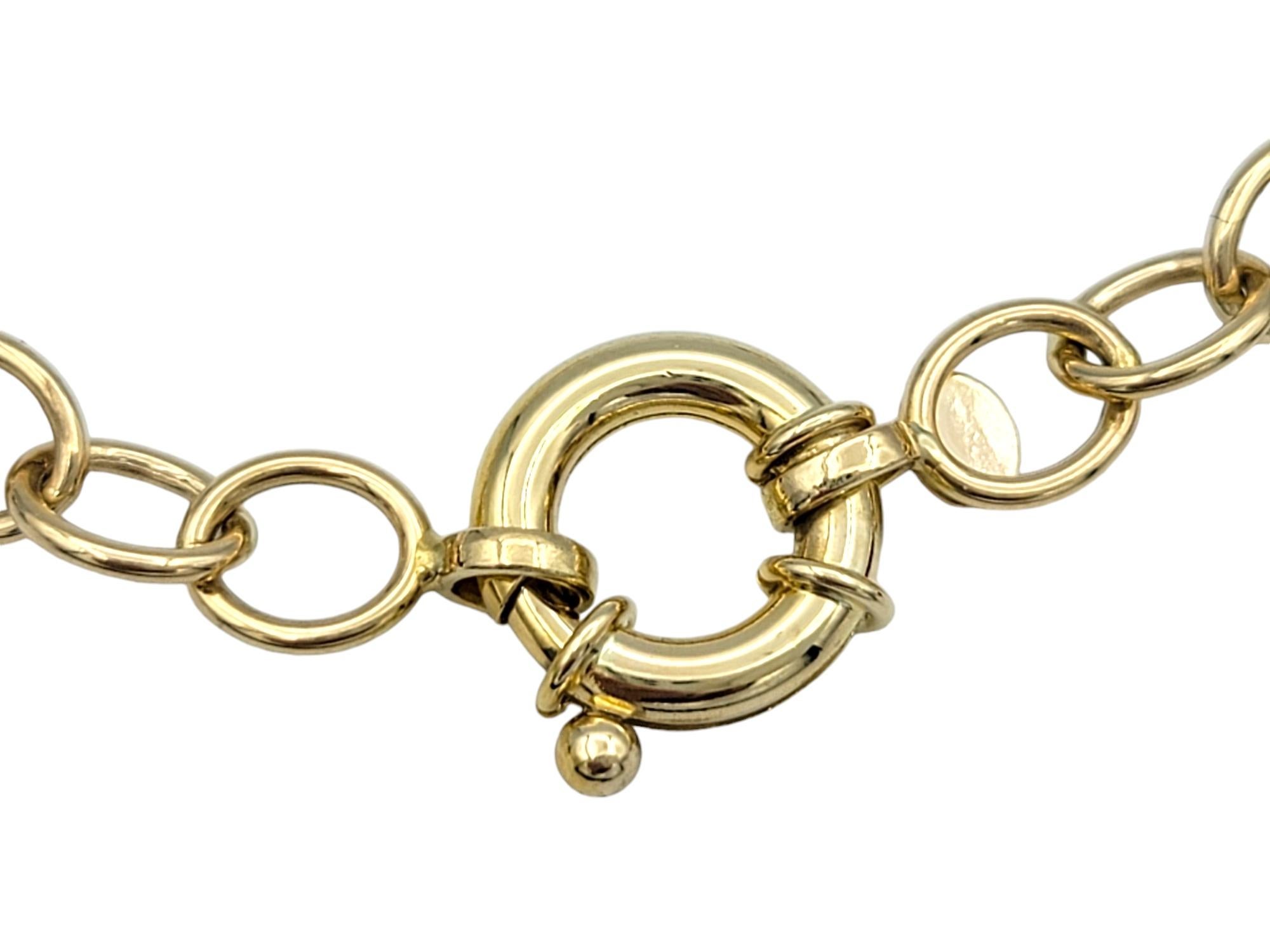 Women's 14 Karat Yellow Gold Circle Link Bracelet with Dangling Ladybug Charms For Sale