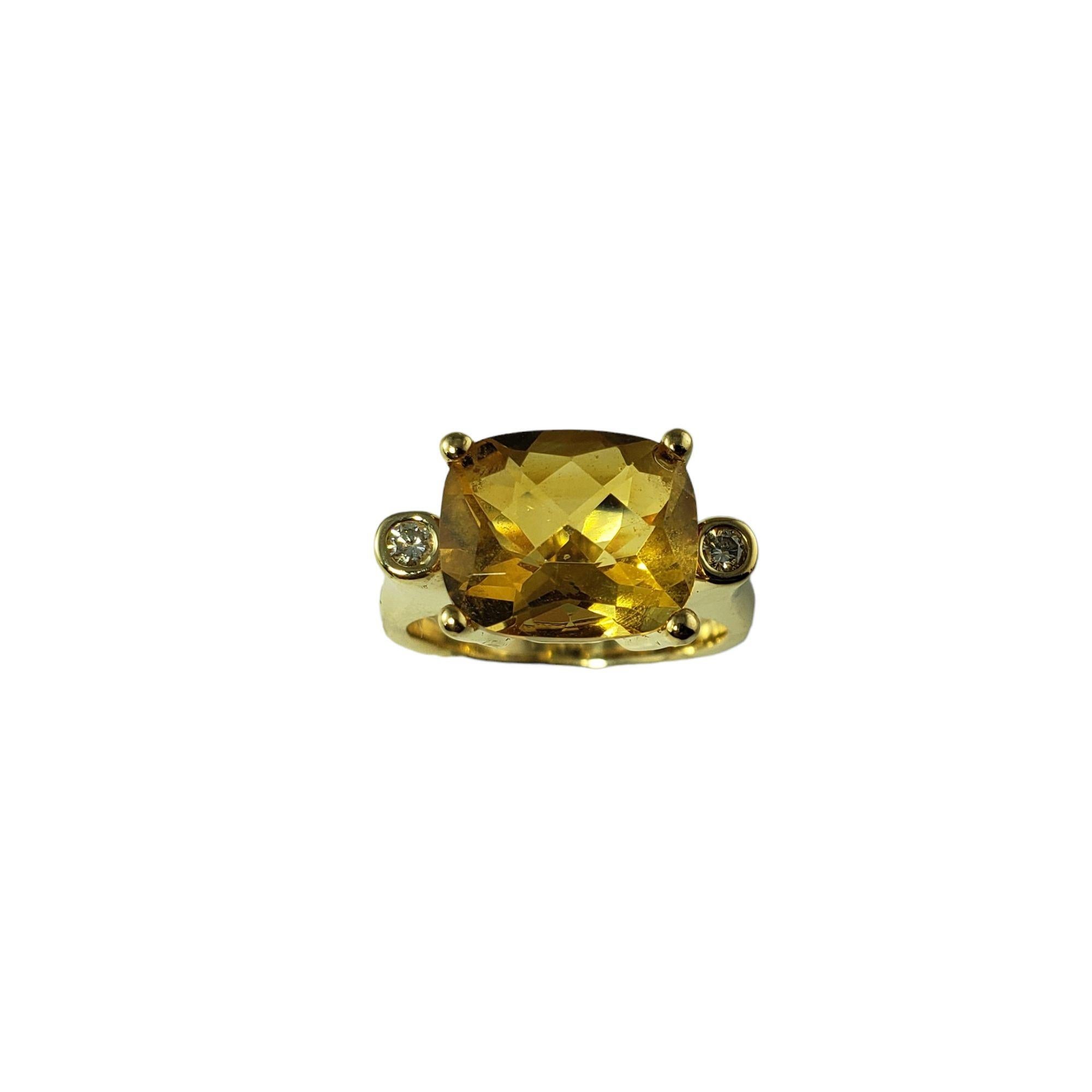 Vintage 14 Karat Yellow Gold Citrine and Diamond Ring Size 7-

This elegant ring features one oval east/west set citrine stone (12 mm x 10 mm) and two round brilliant cut diamonds set in classic 14K yellow gold.  Shank:  3 mm.

Topaz weight:  5.39
