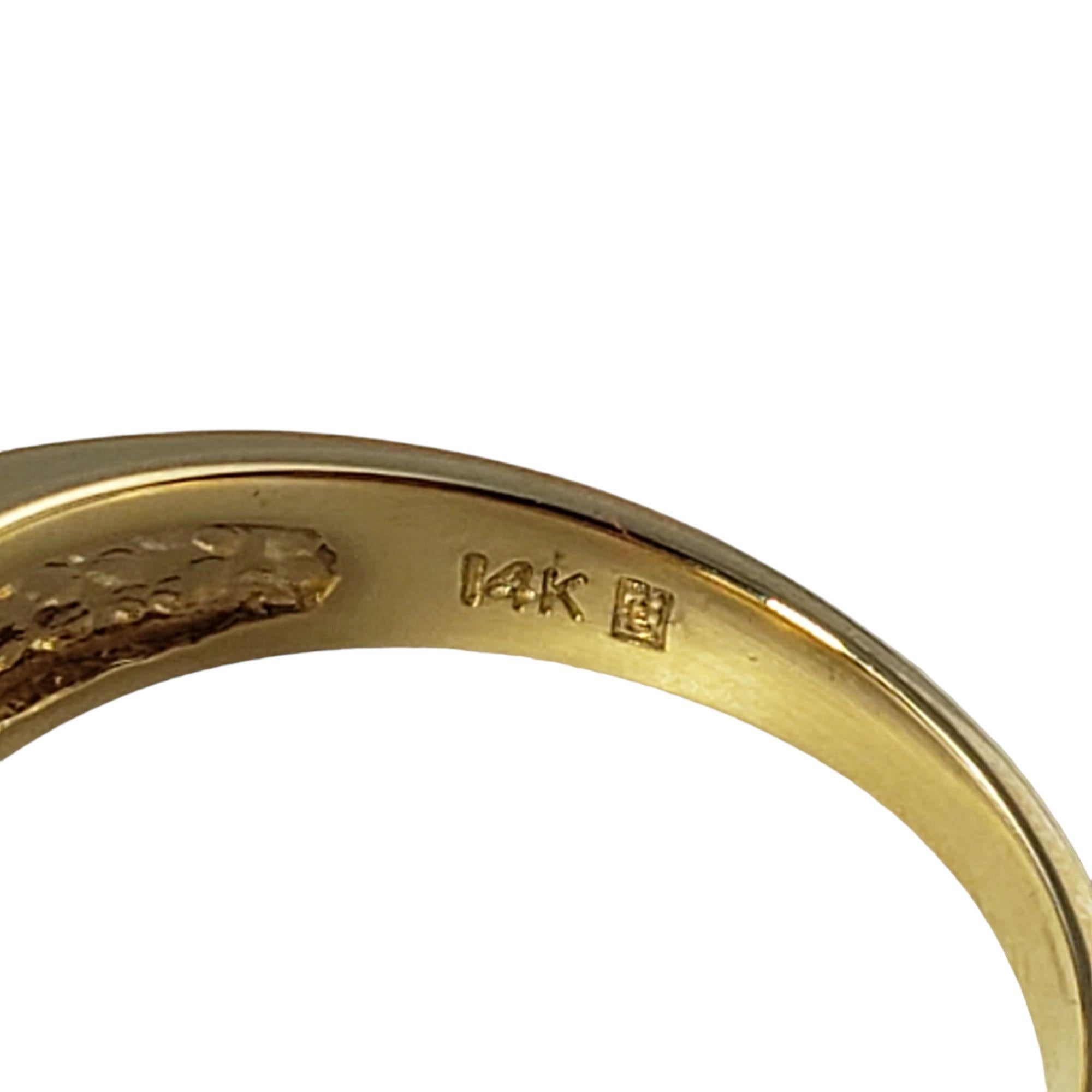 Vintage 14 Karat Yellow Gold Citrine Quartz and Diamond Ring Size 8 JAGi Certified-

This stunning ring features one cushion cut citrine quartz and 14 round brilliant cut diamonds set in classic 14K yellow gold.
Width: 14 mm. Shank: 2 mm.

Citrine