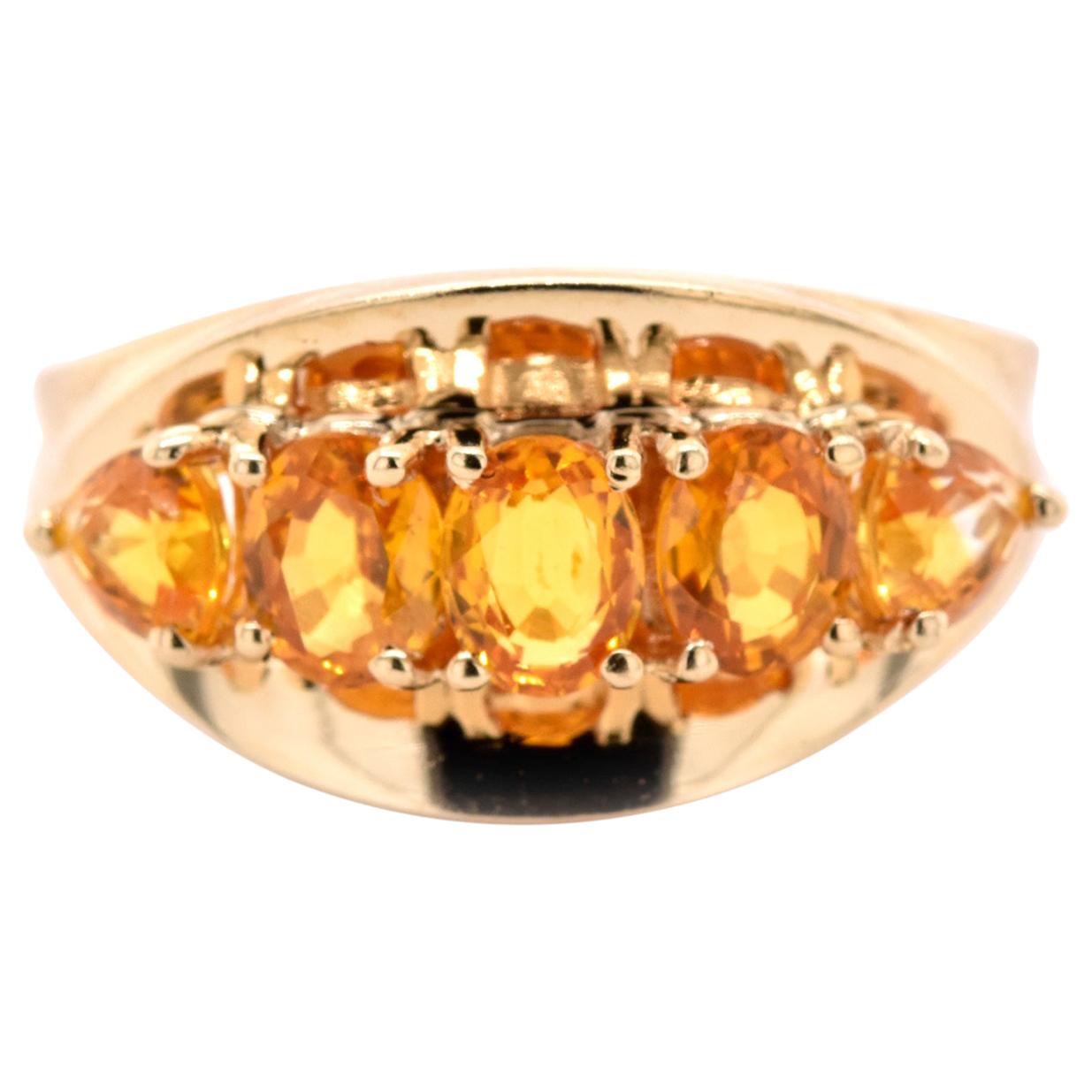 Ring aus 14 Karat Gelbgold mit Citrin und Granat