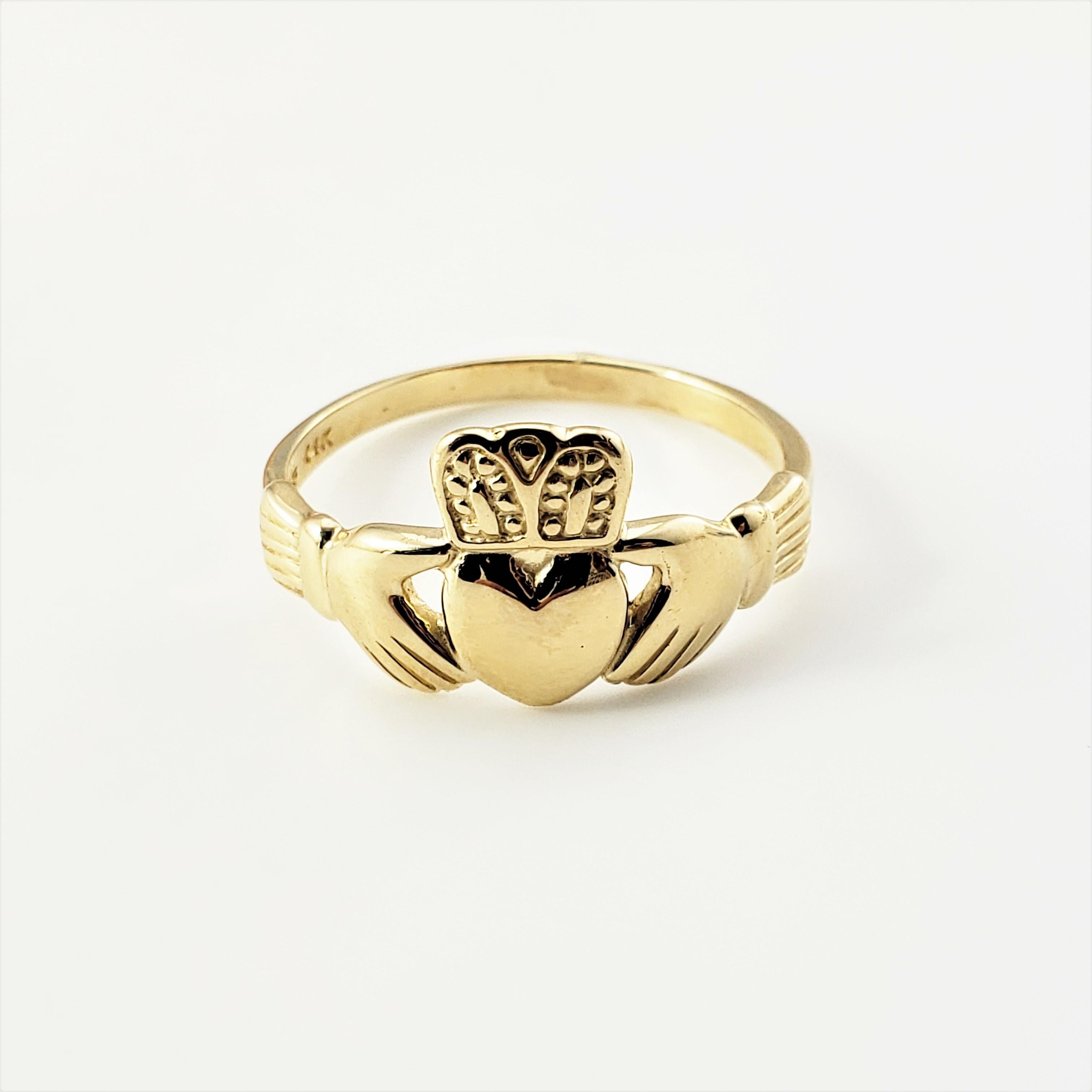 14 Karat Yellow Gold Claddagh Ring Size 10.75-

The traditional Irish Claddagh ring is a symbol of friendship, love and loyalty.  Beautifully detailed in 14K yellow gold.  Width: 12 mm.
Shank:  2 mm.

Ring Size: 10.75

Weight:  2.5 dwt. /  4.0